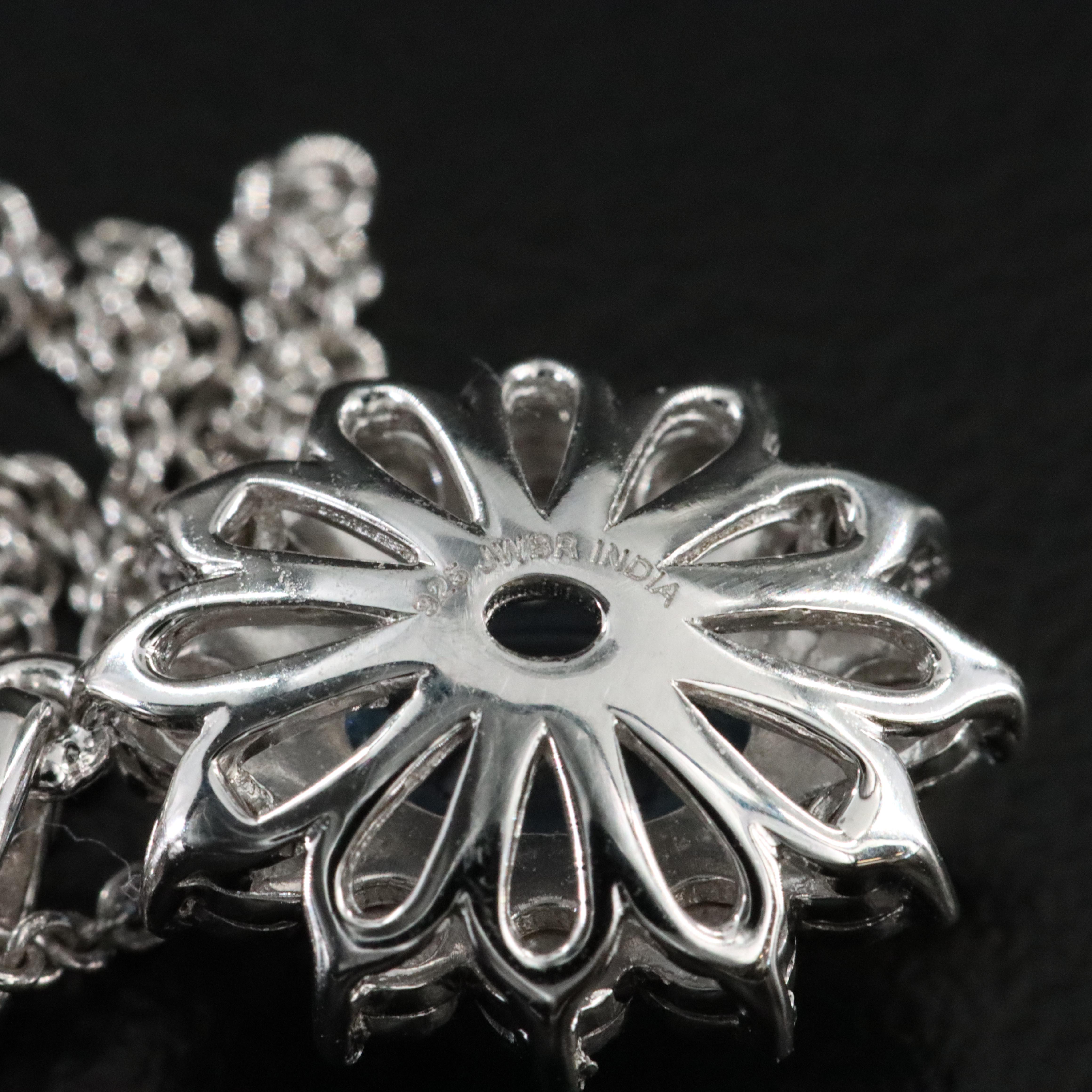 Sterling Blue Topaz and Diamond Pendant Necklace