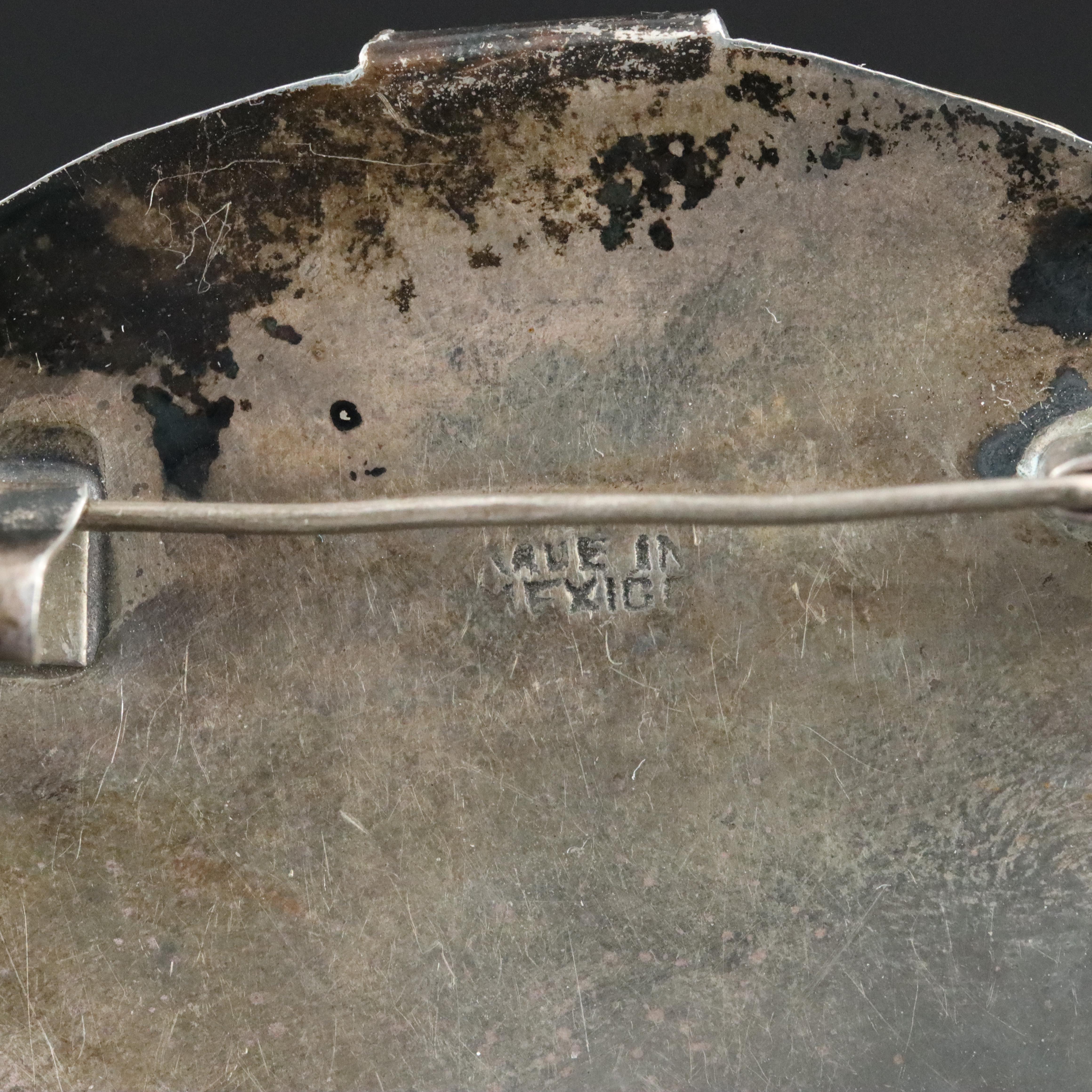 Sterling Carved Calcite Figural Brooch