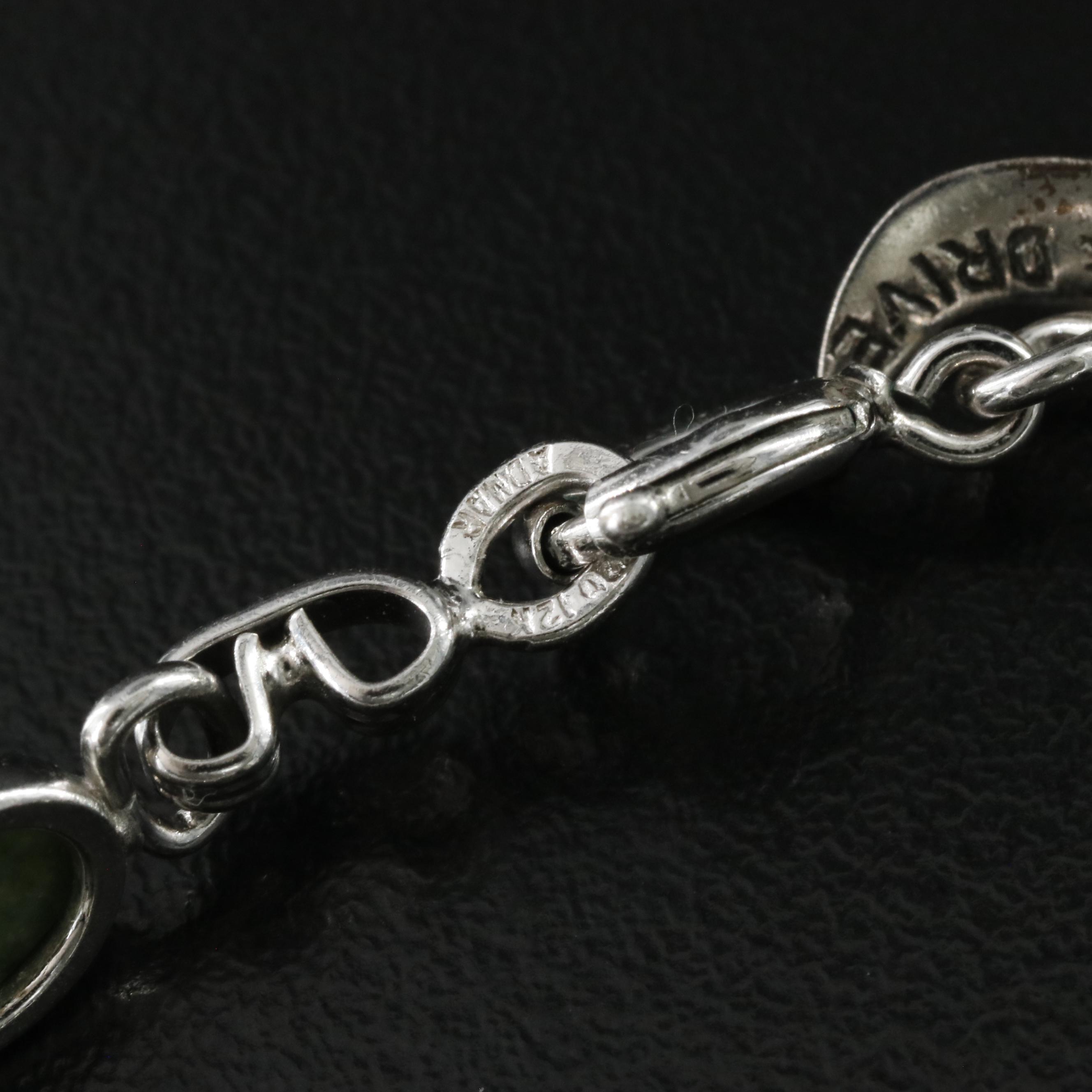 Gold-Filled Charm Bracelet Featuring Sterling Charms and Connemara Marble