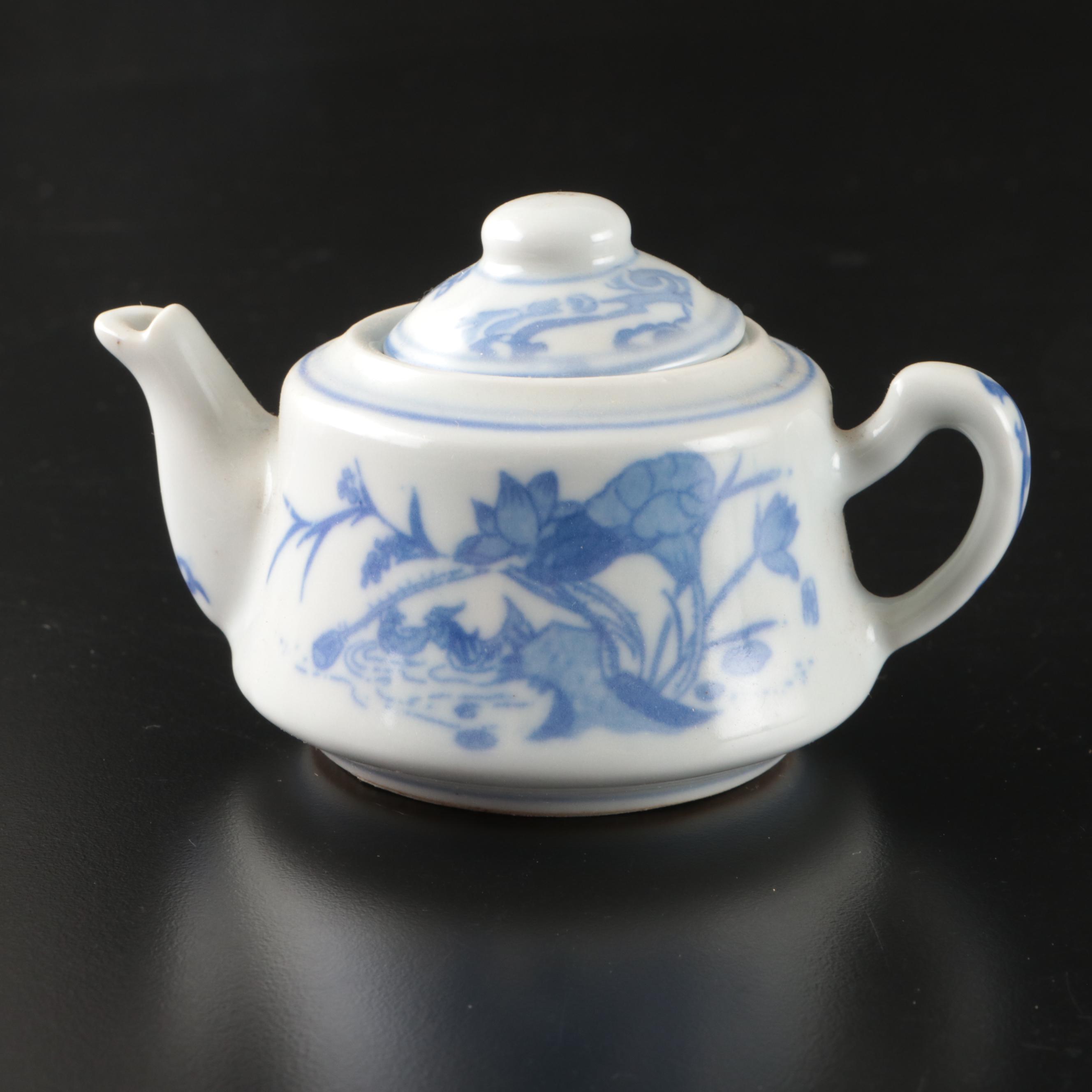 Chinese Miniature Porcelain Teapot and Cups with Underplate