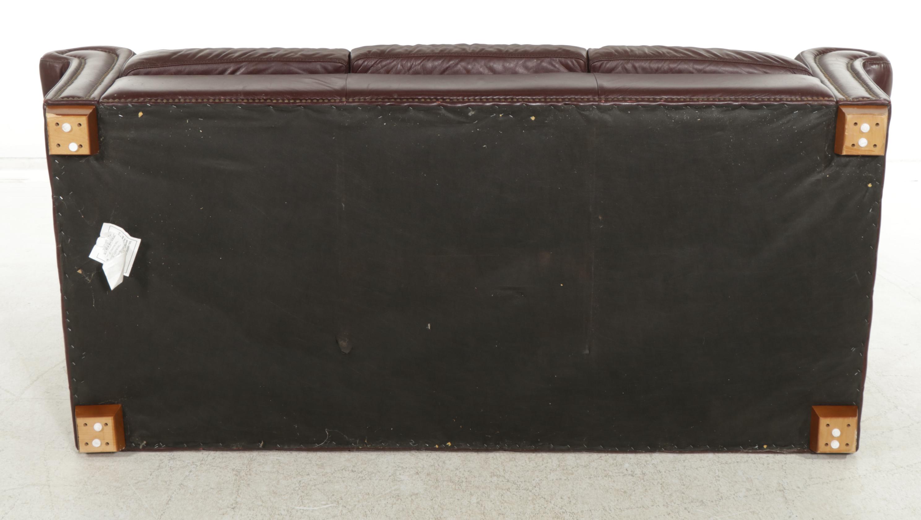 Chateau d'Ax Italian Leather Upholstered Sofa, Armchair, and Ottoman, 2001