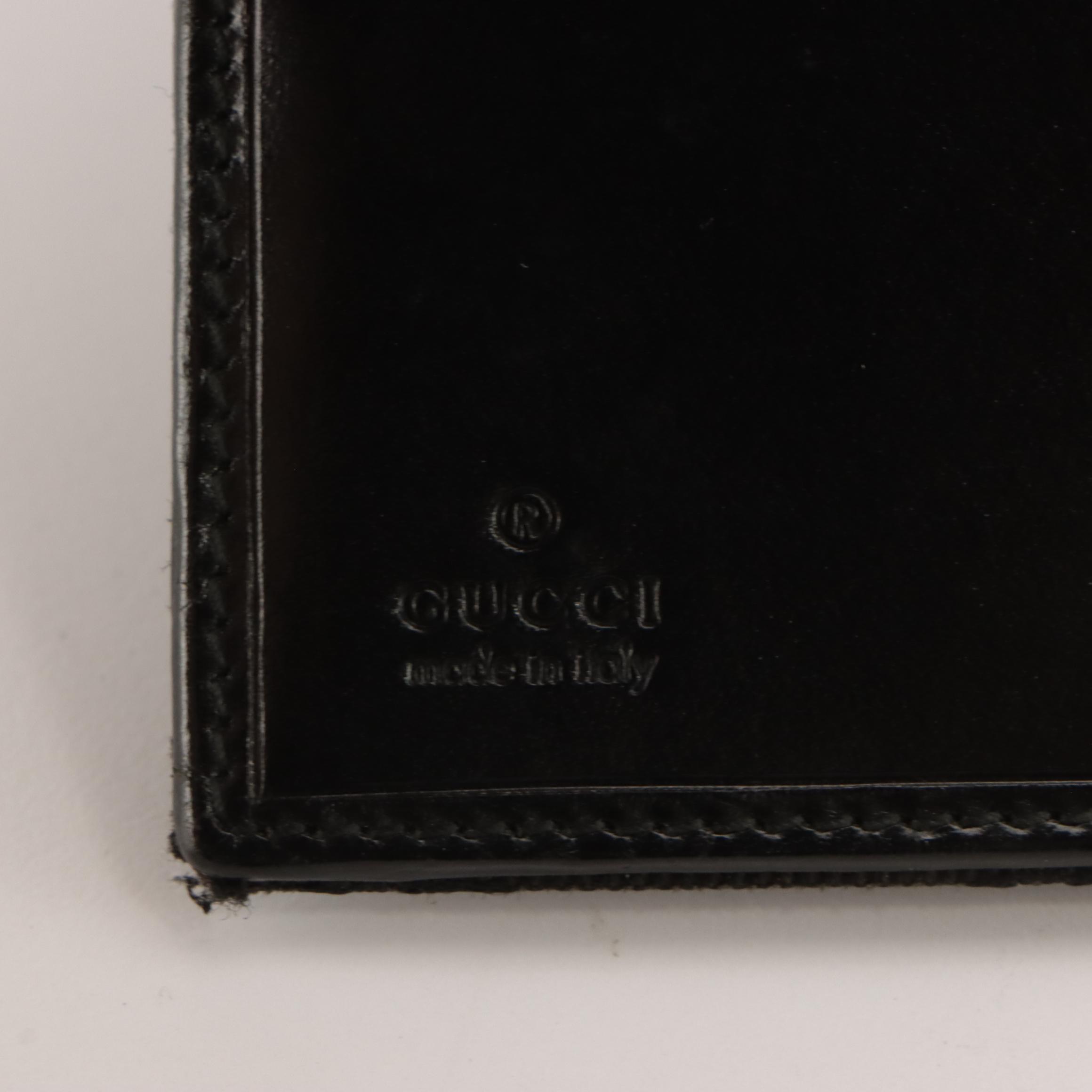 Gucci Jackie Bifold Wallet in Black GG Canvas and Black Leather