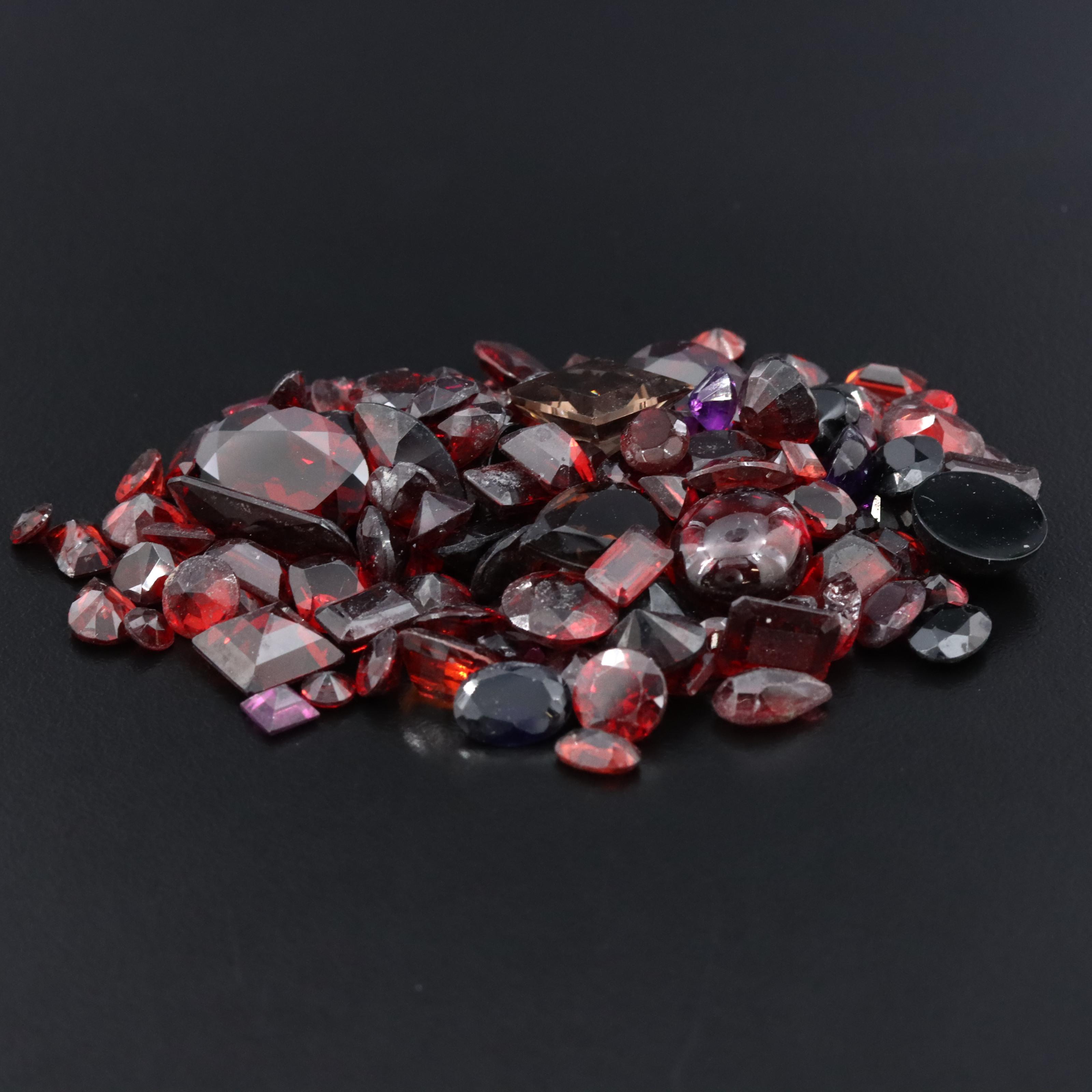 Loose 150.32 CTW Gemstones Including Garnet, Smoky Quartz and Amethyst