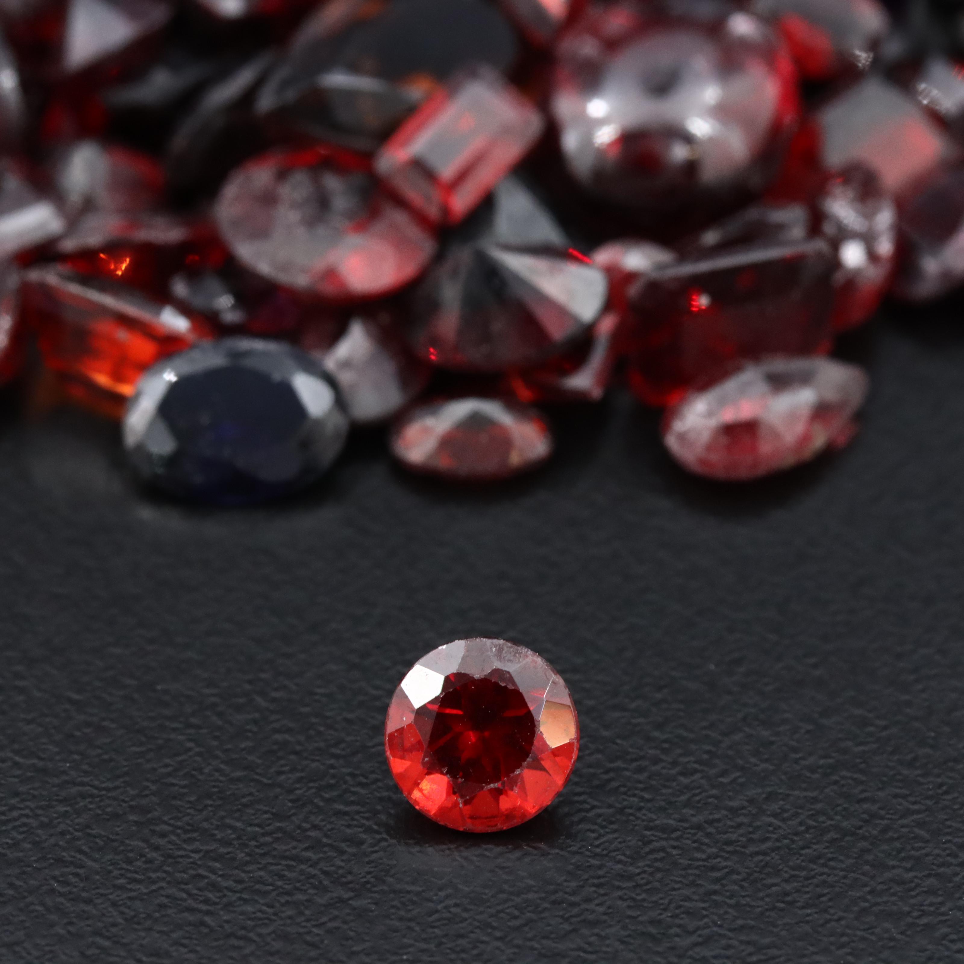 Loose 150.32 CTW Gemstones Including Garnet, Smoky Quartz and Amethyst