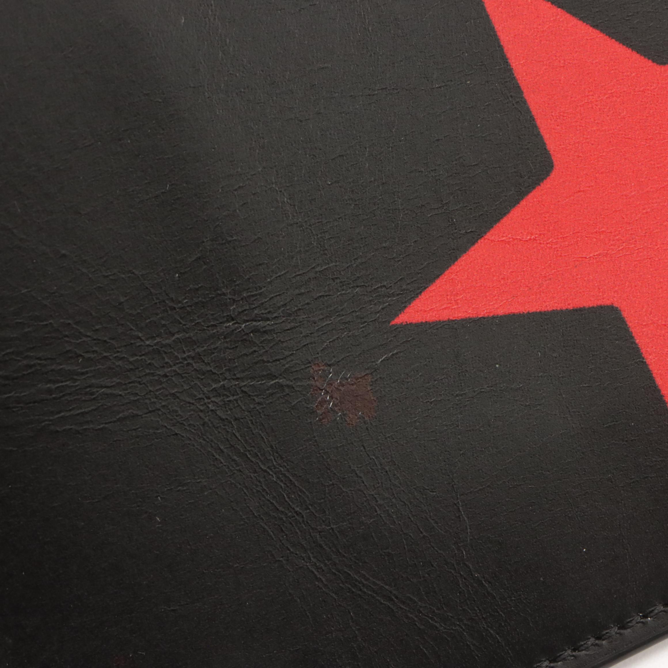 Givenchy Star Zip Clutch in Black Leather