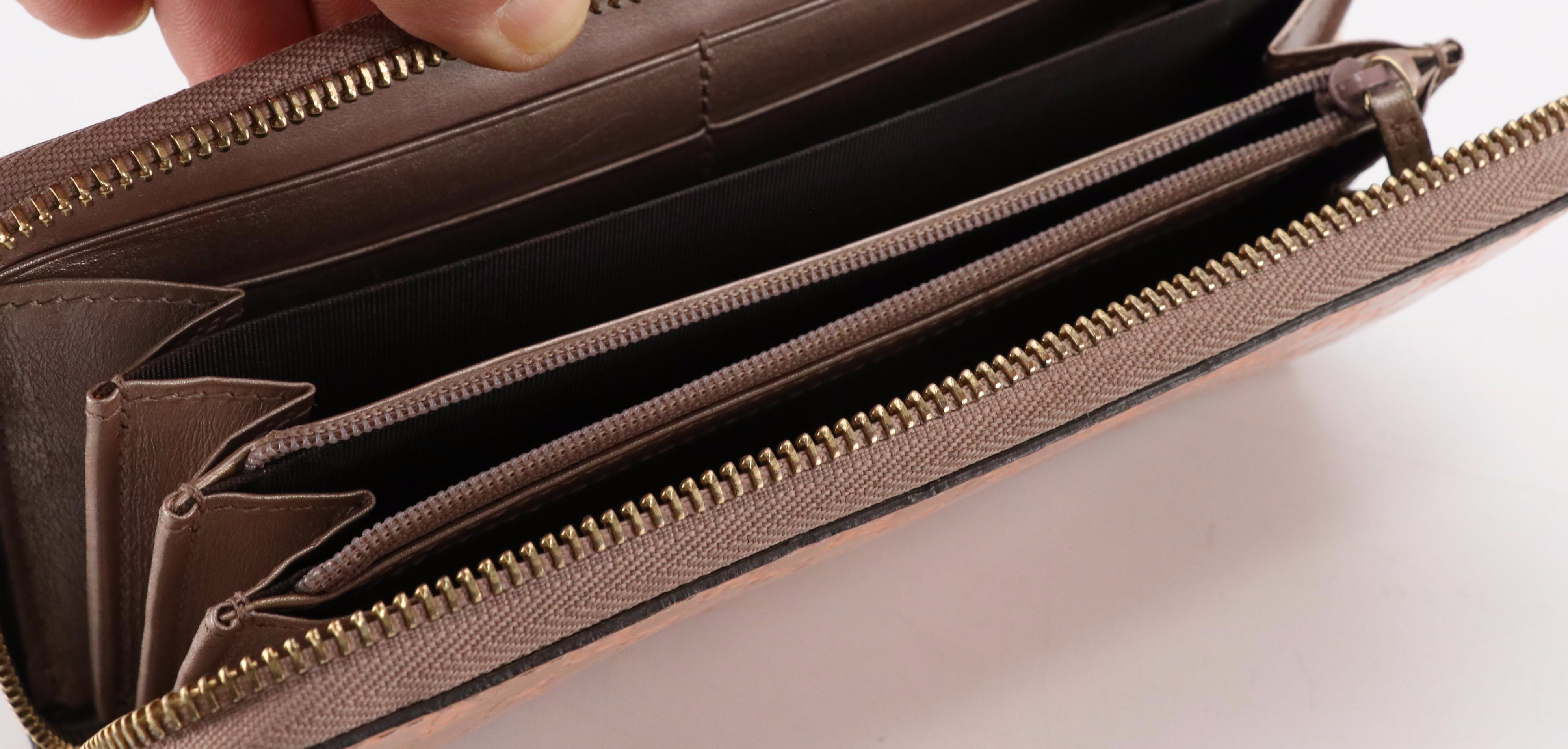 Gucci Zip-Around Wallet in Microguccissima Patent Leather with Gucci Heart Zip