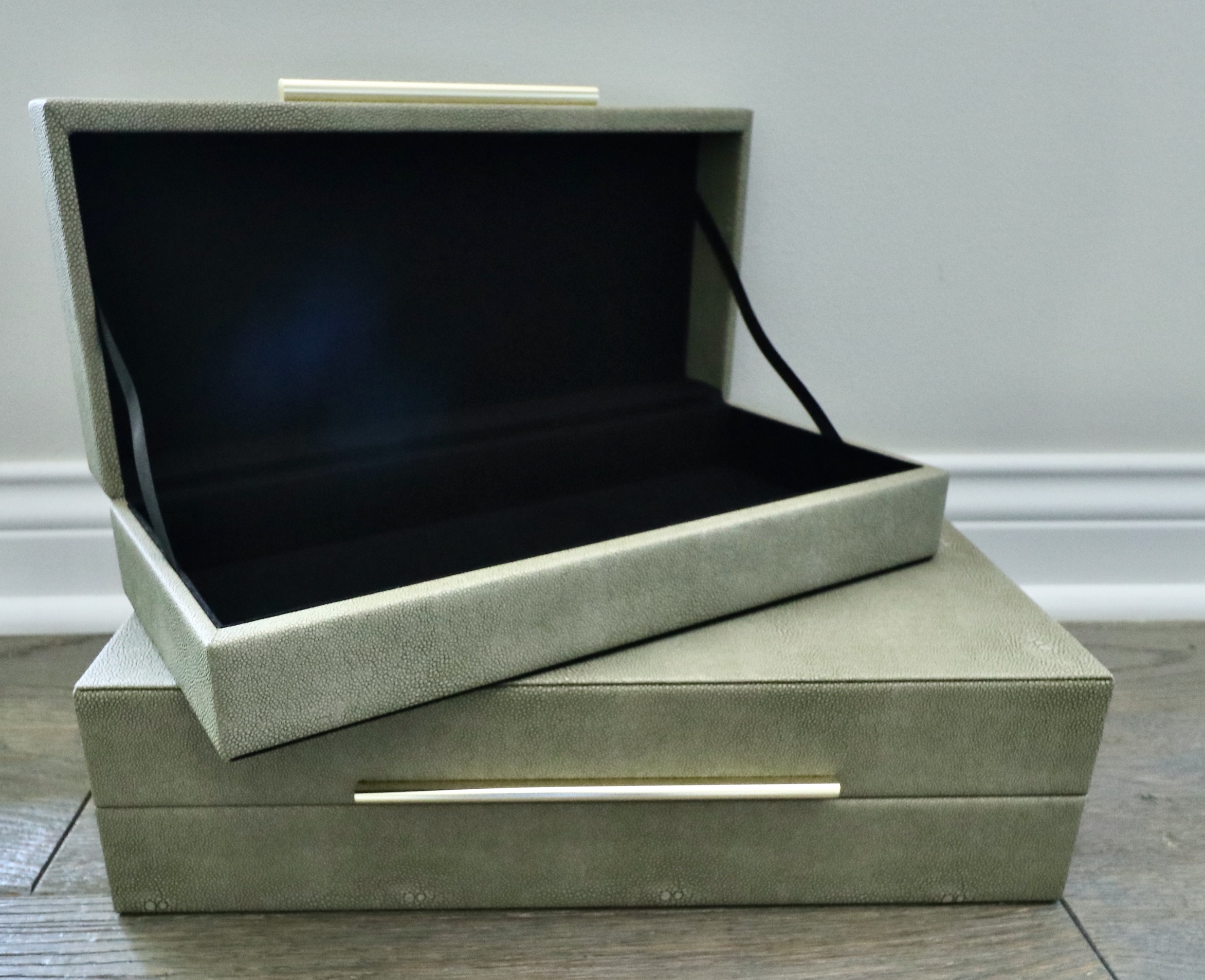 Trojan Wood Horse on Plinth, Faux Shagreen Trays and Boxes, and Accent Pillows