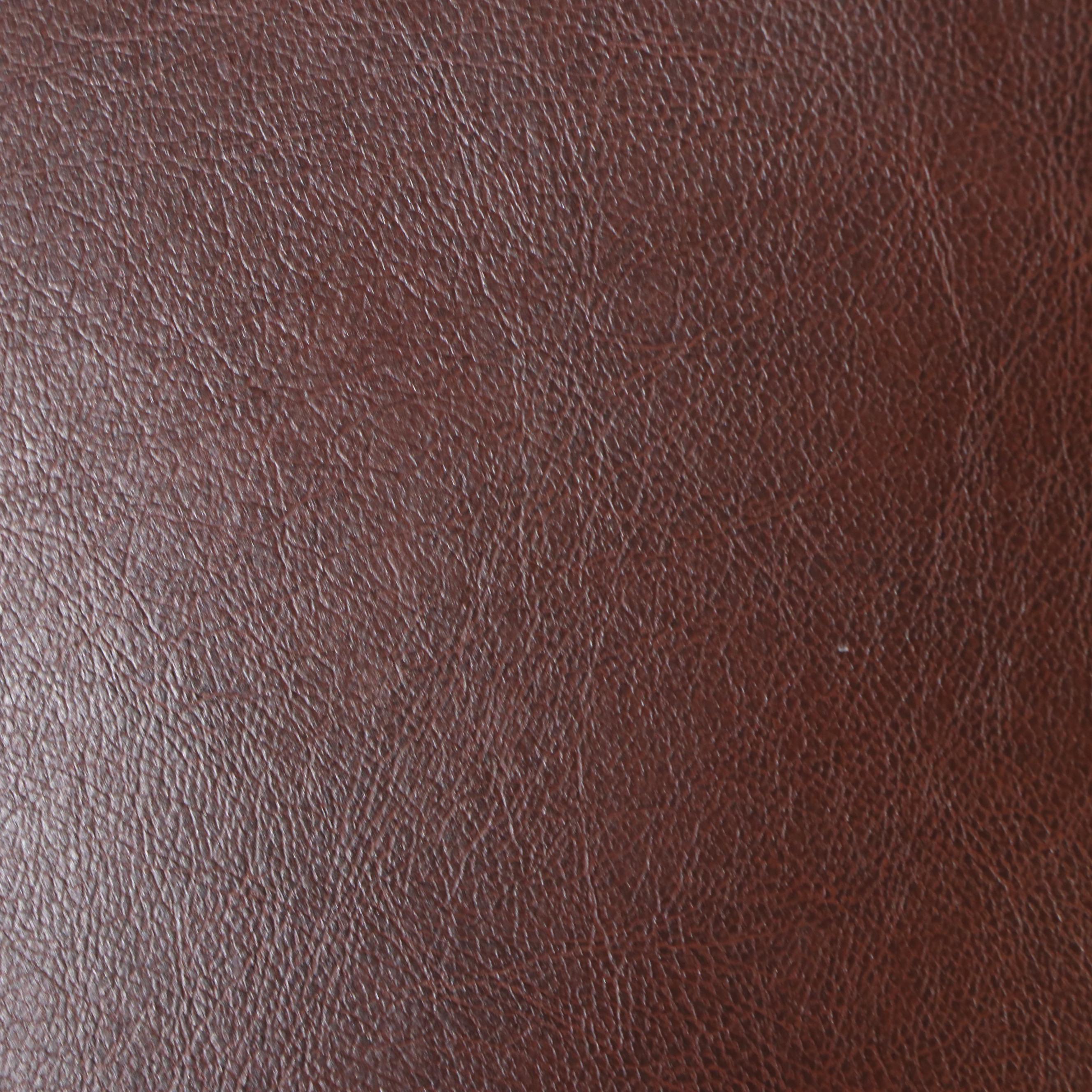 Contemporary Brown Faux Leather Armchair and Ottoman