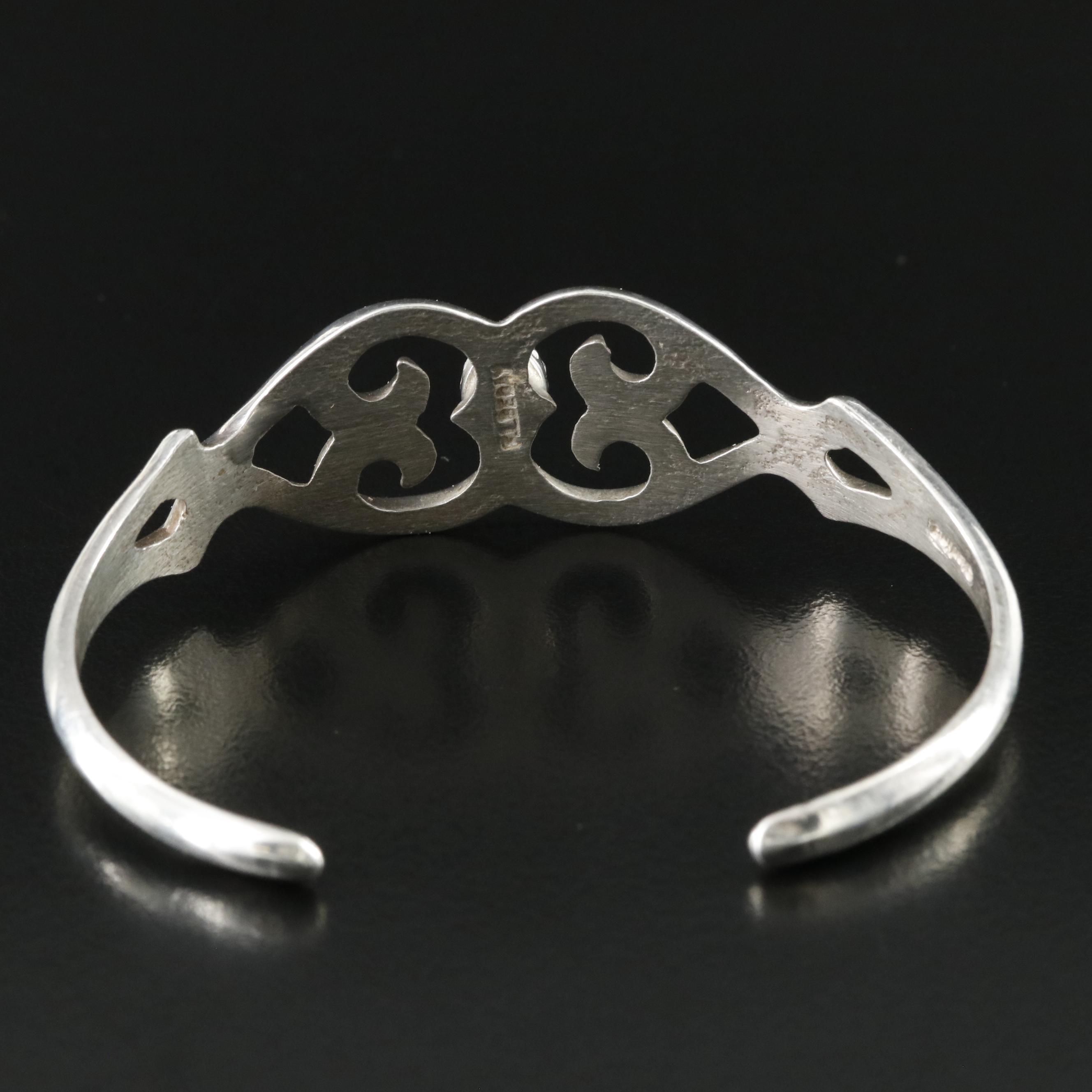 Francis L. Begay Navajo Diné Sterling Turquoise Sandcast Cuff