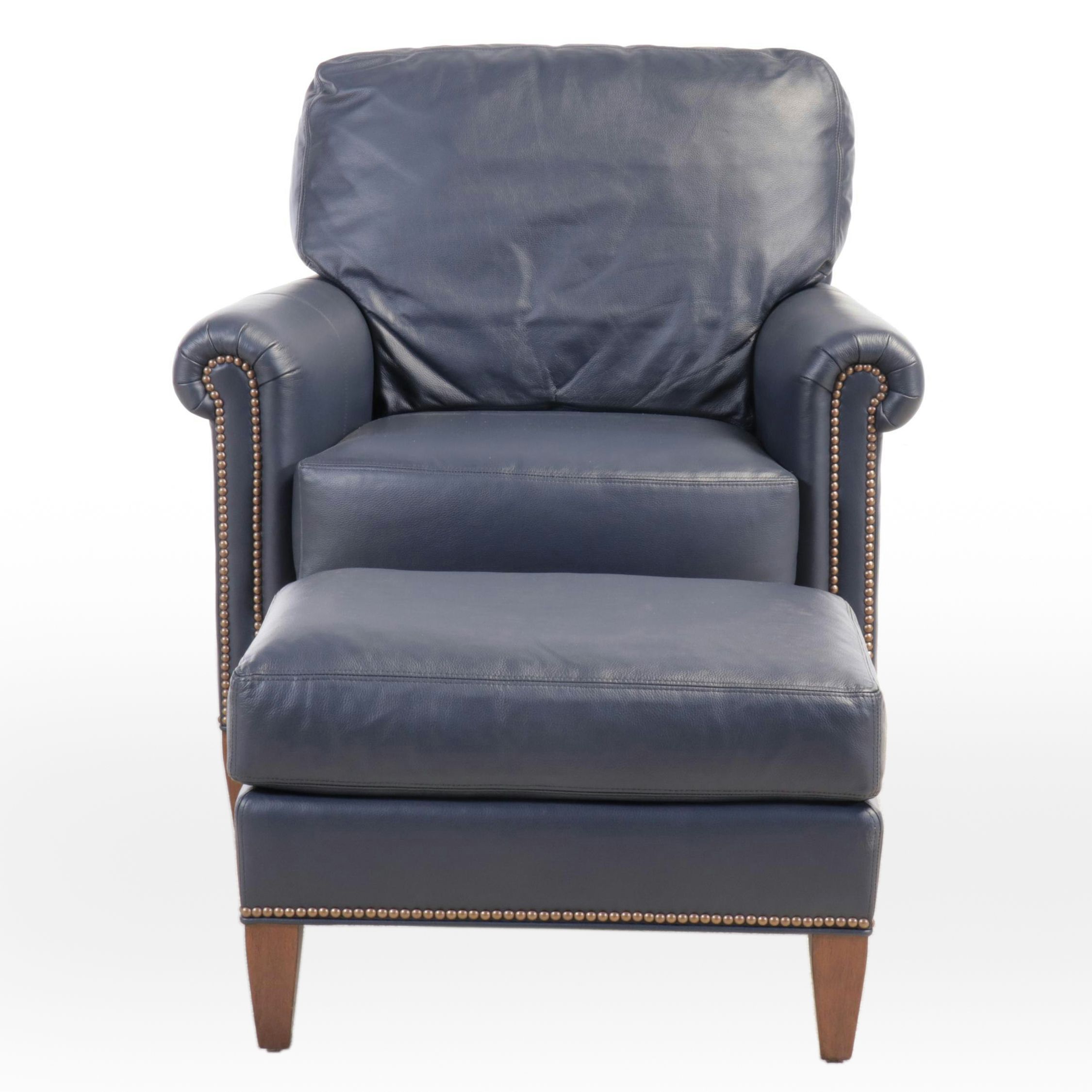 Designer's Choice Leather Upholstered Armchair and Ottoman with Nailhead Trim