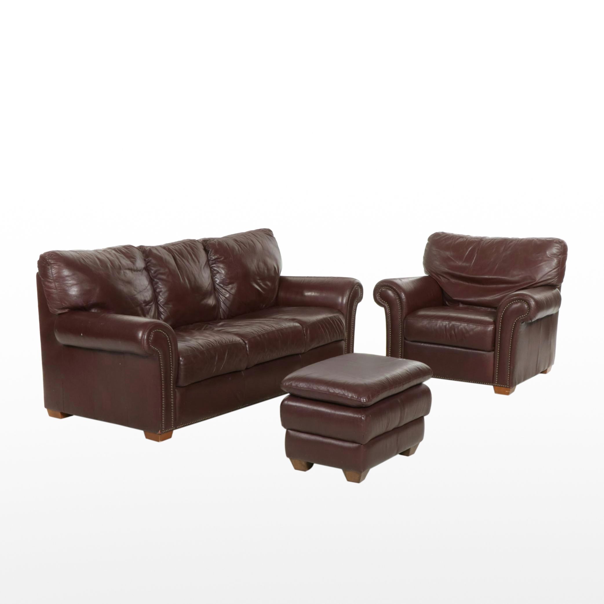 Chateau d'Ax Italian Leather Upholstered Sofa, Armchair, and Ottoman, 2001