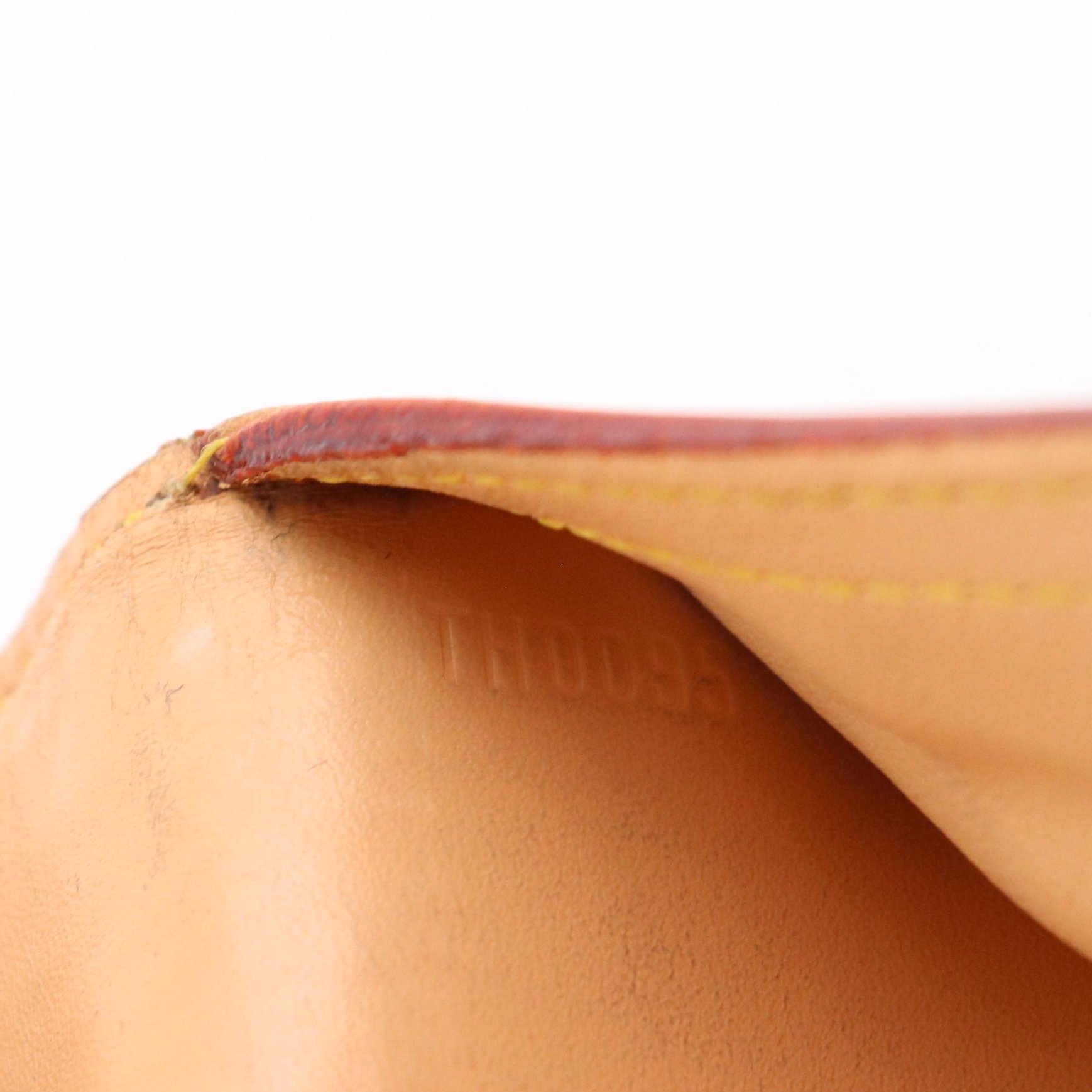 Louis Vuitton Porte-Trésor International in Black Monogram Multicolore Canvas