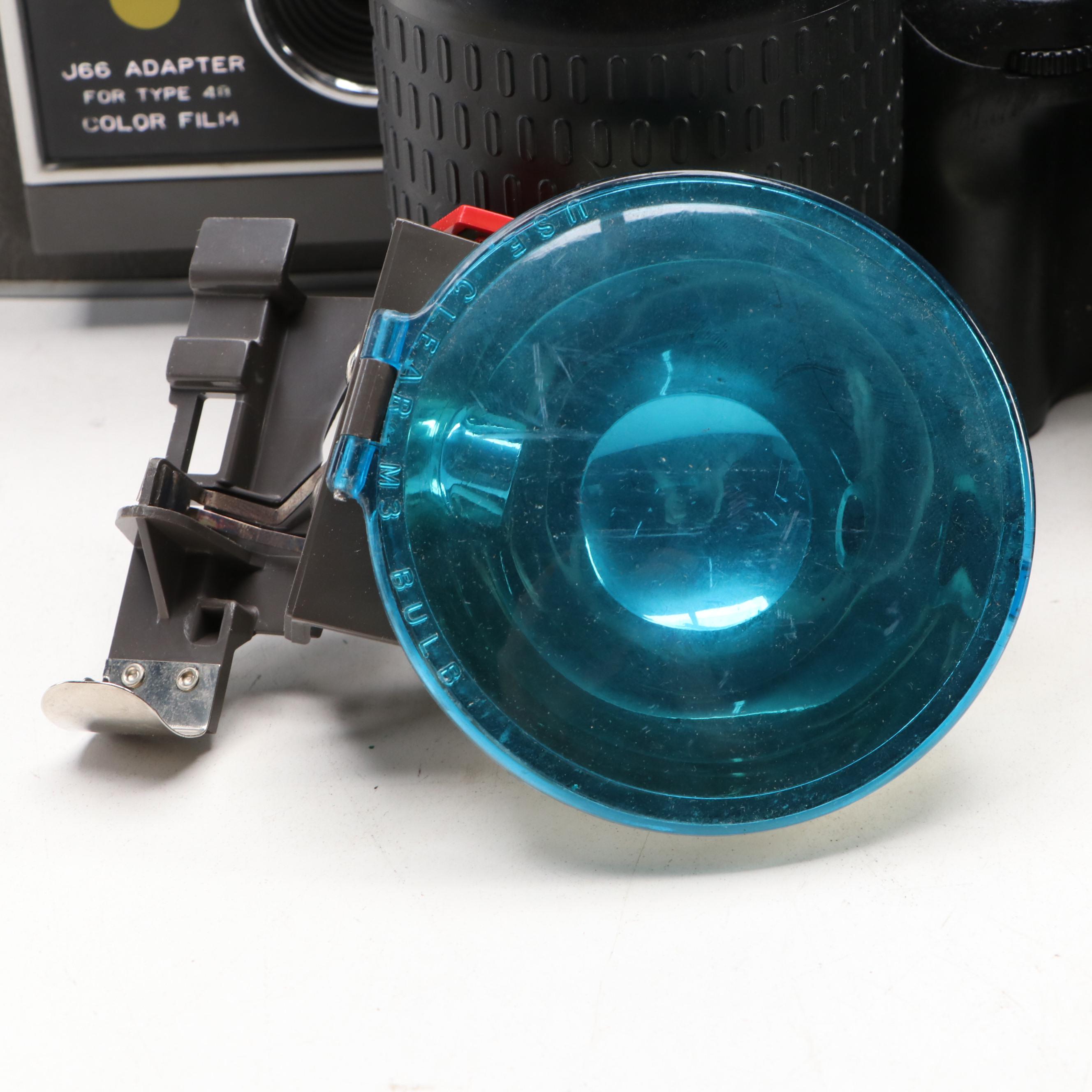 Polaroid J66 Land Camera, Digital Nikon Pronea 6i with Sylvania Flashbulbs