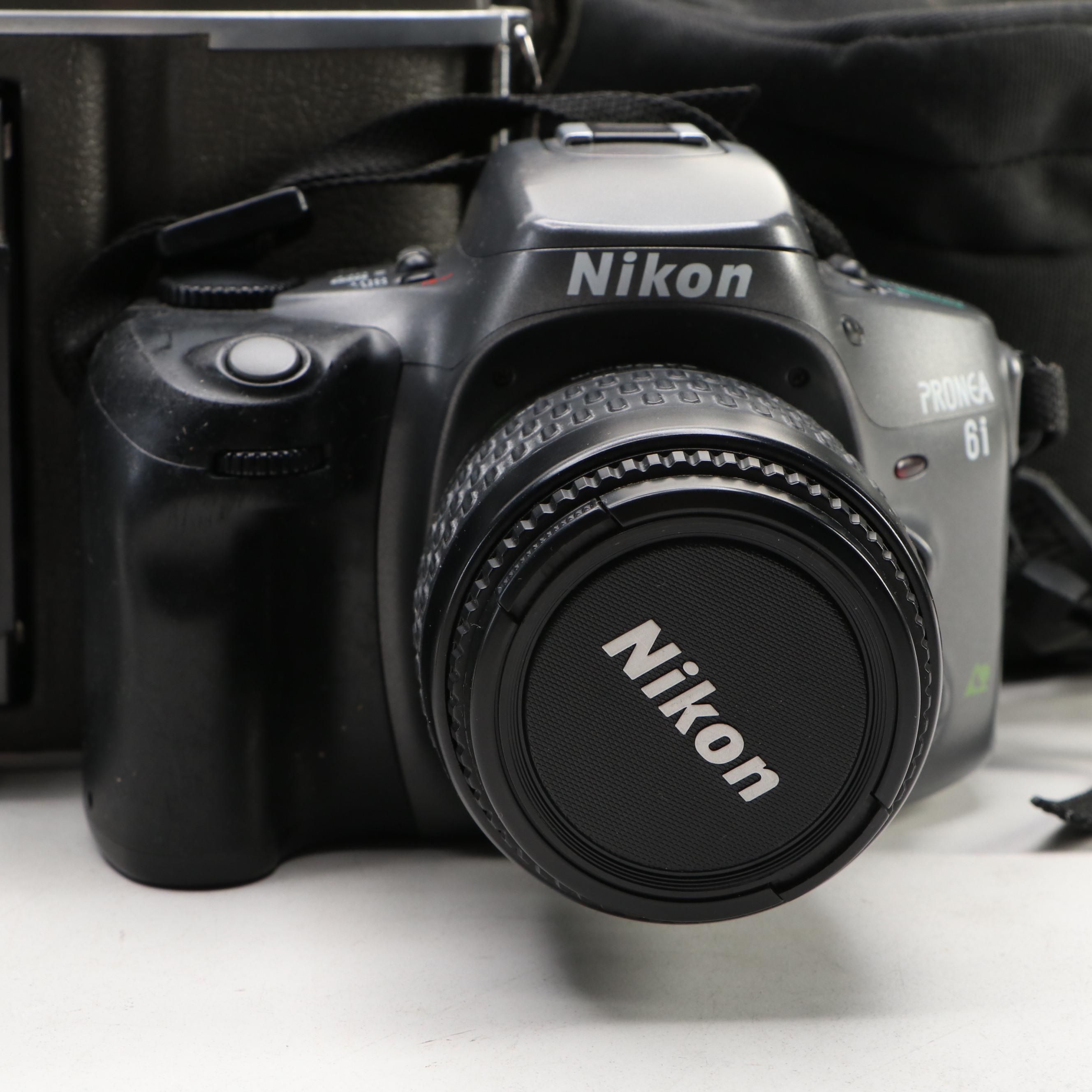 Polaroid J66 Land Camera, Digital Nikon Pronea 6i with Sylvania Flashbulbs