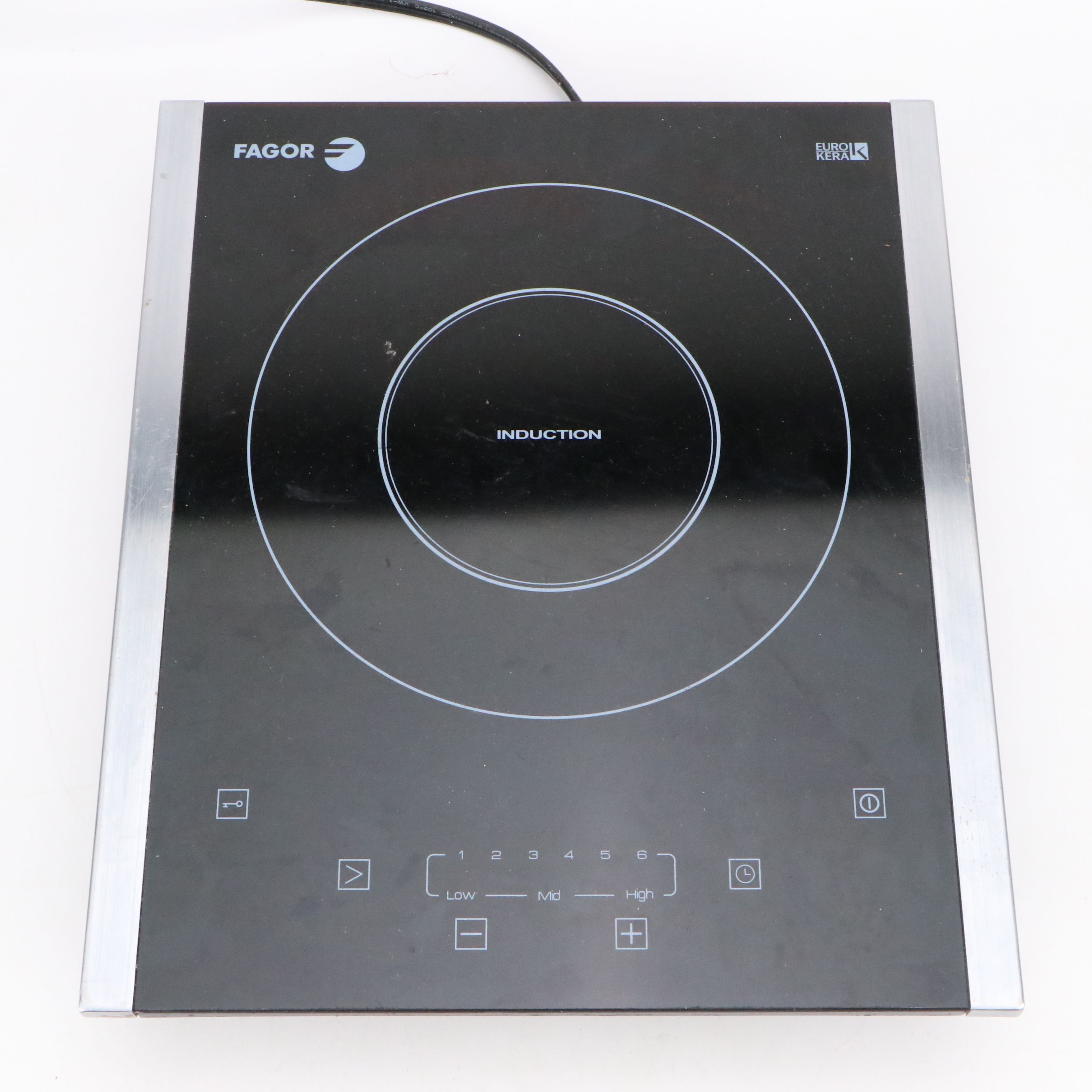 Fagor Portable Induction Cooktop with Knives, Rolling Pins and Baguette Miter
