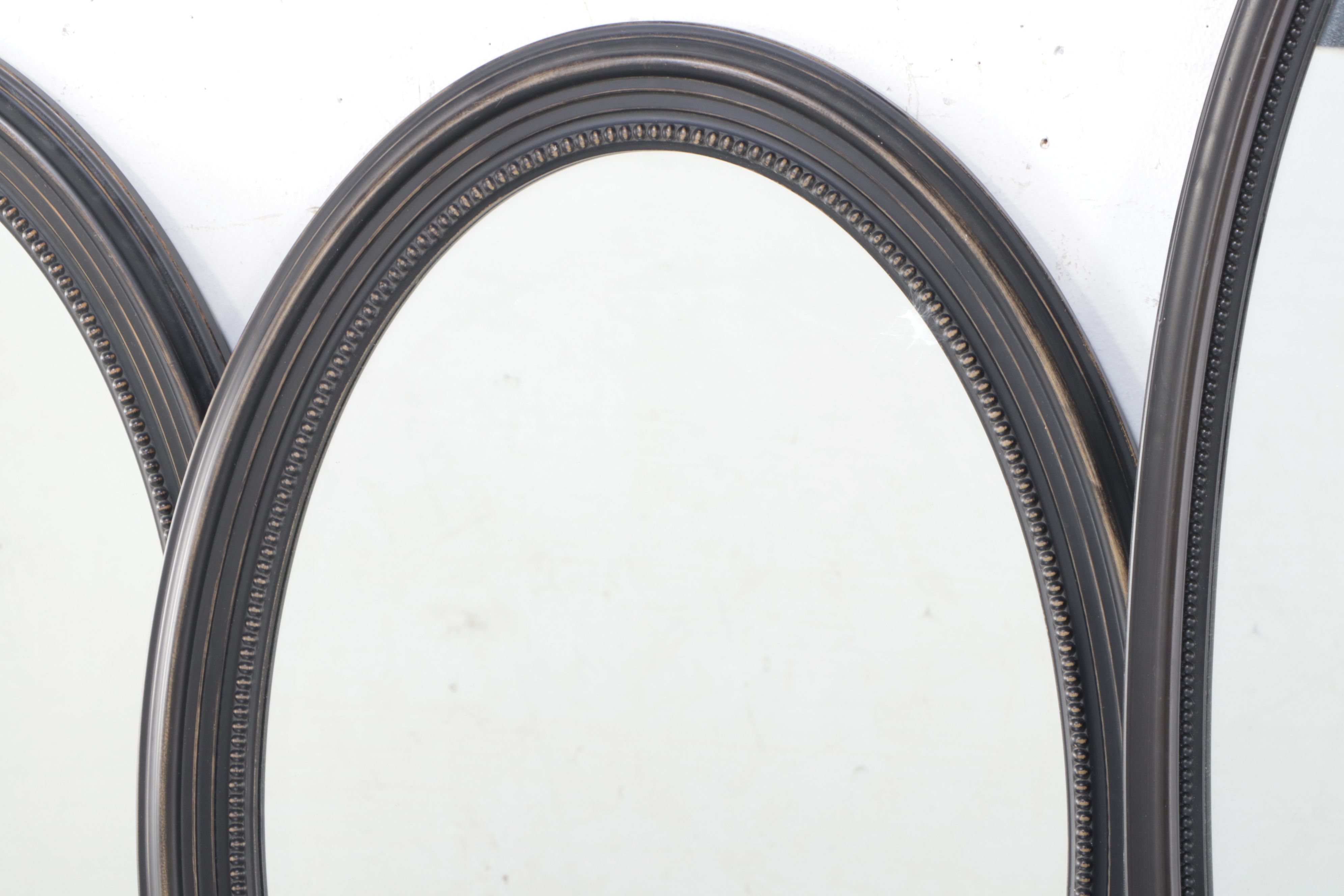 Victorian Style Distressed Black Wooden Framed Oval Wall Mirrors