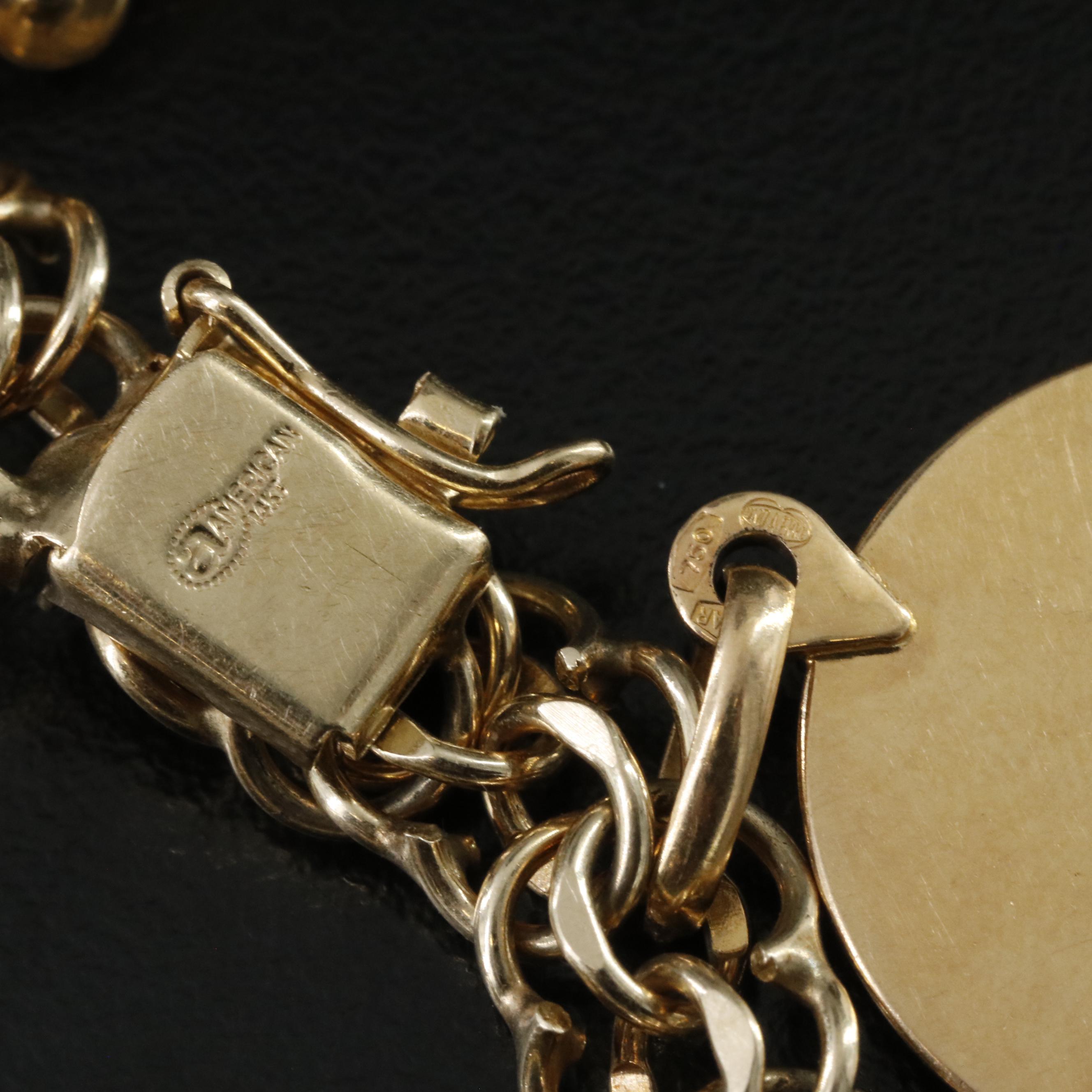 14K Charm Bracelet Including 18K, 10K, 9K and Articulated Charms