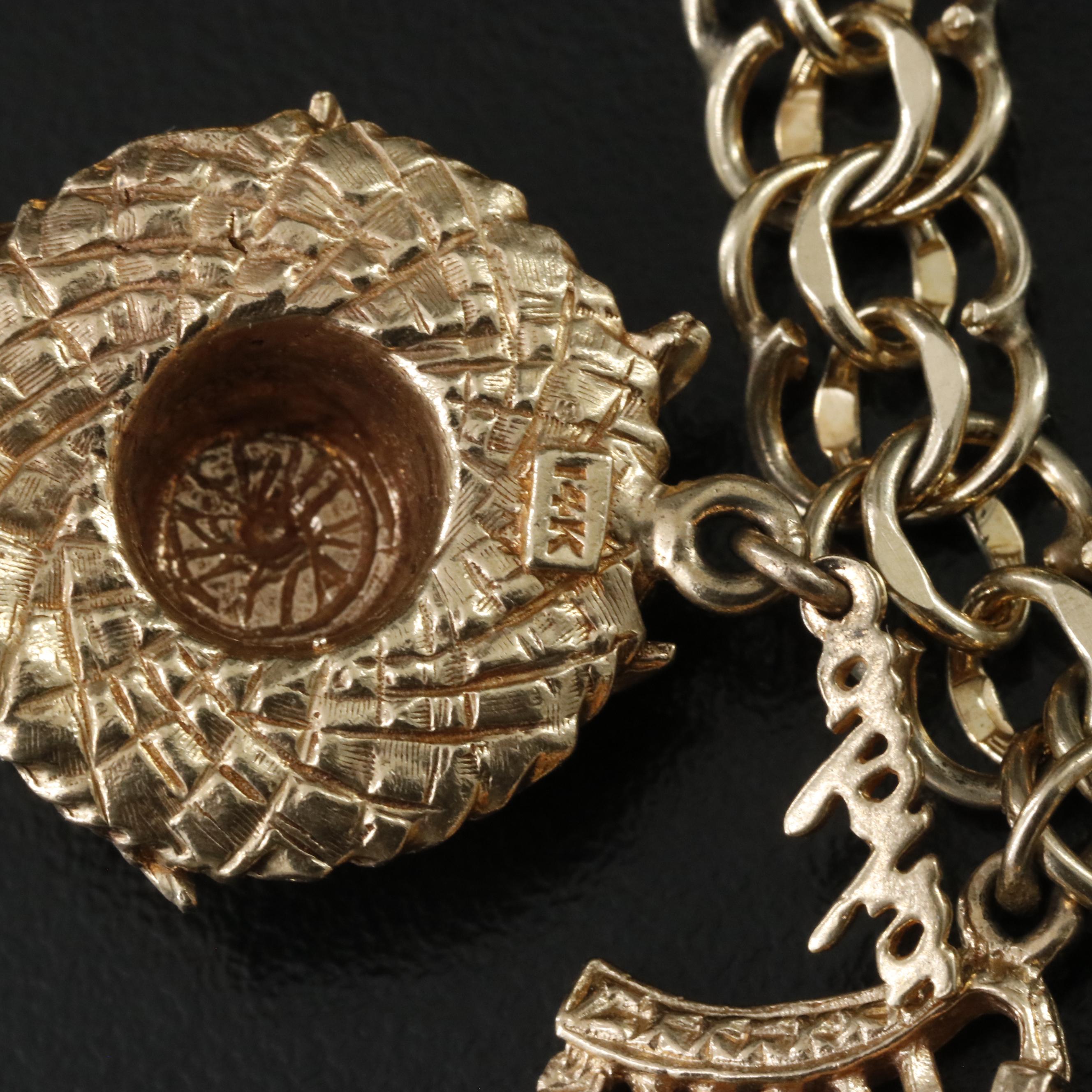 14K Charm Bracelet Including 18K, 10K, 9K and Articulated Charms