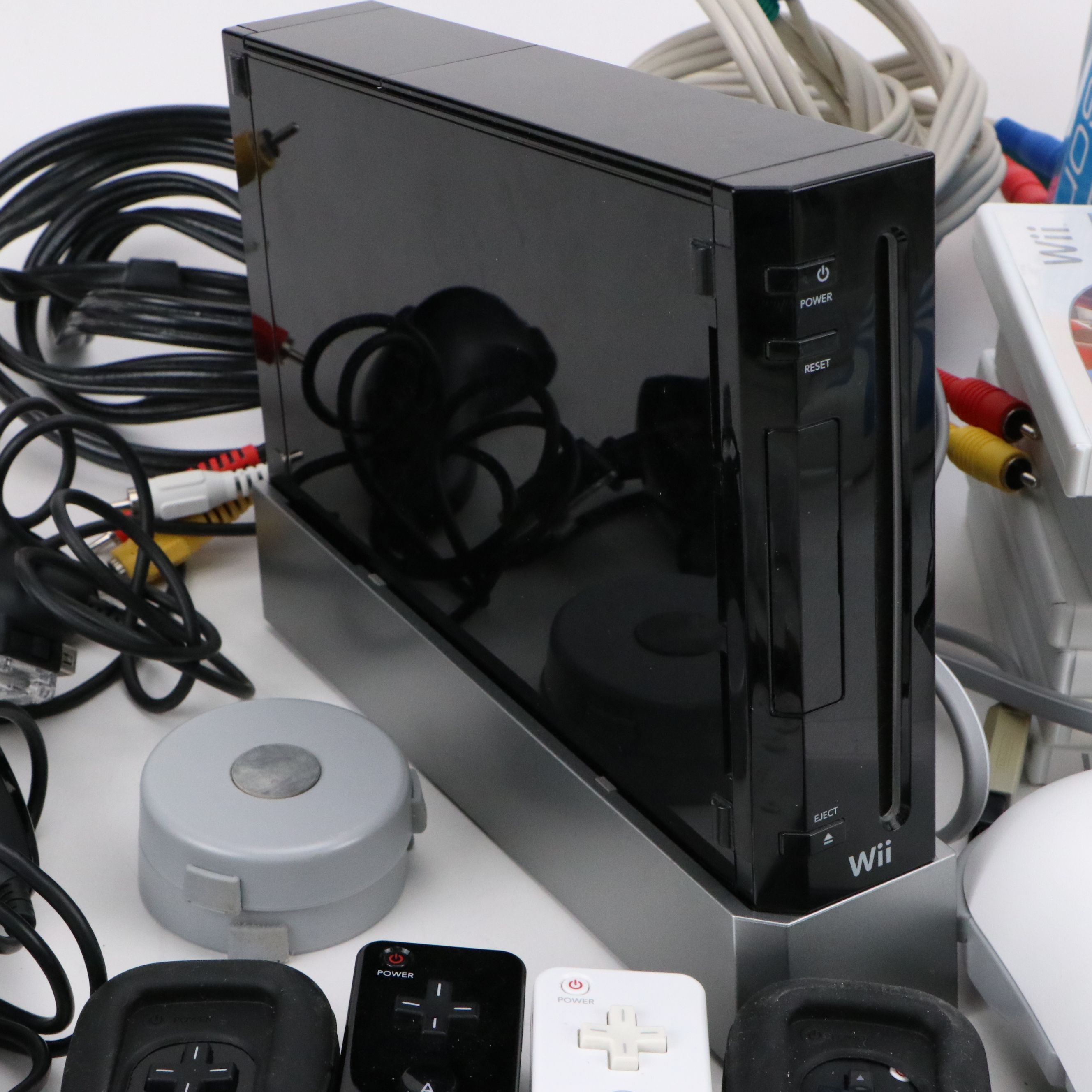 Nintendo Wii with Wii Fit, Wii Sports, and Other Games and Accessories