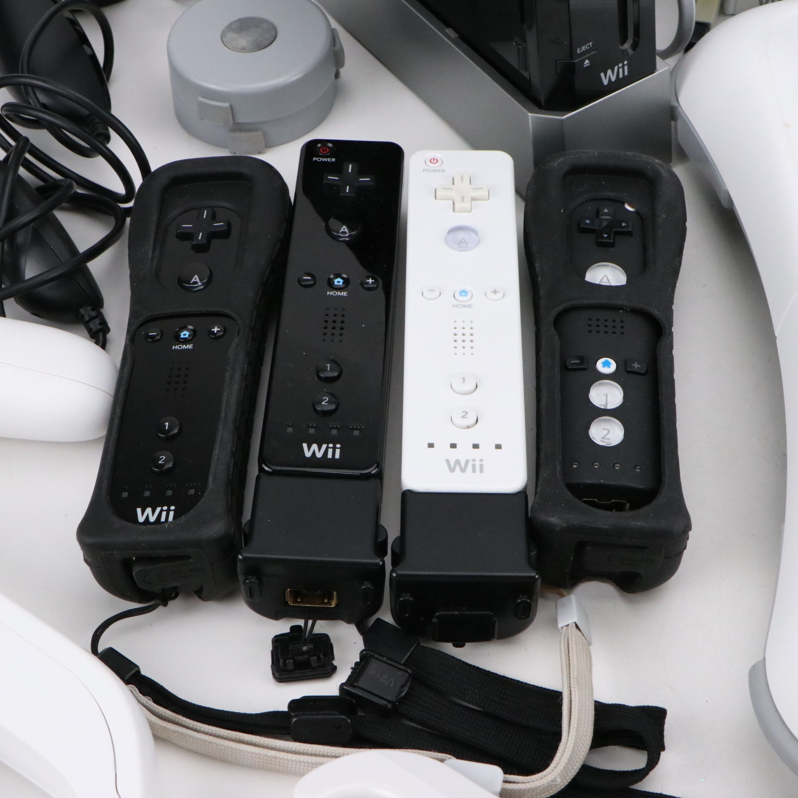 Nintendo Wii with Wii Fit, Wii Sports, and Other Games and Accessories