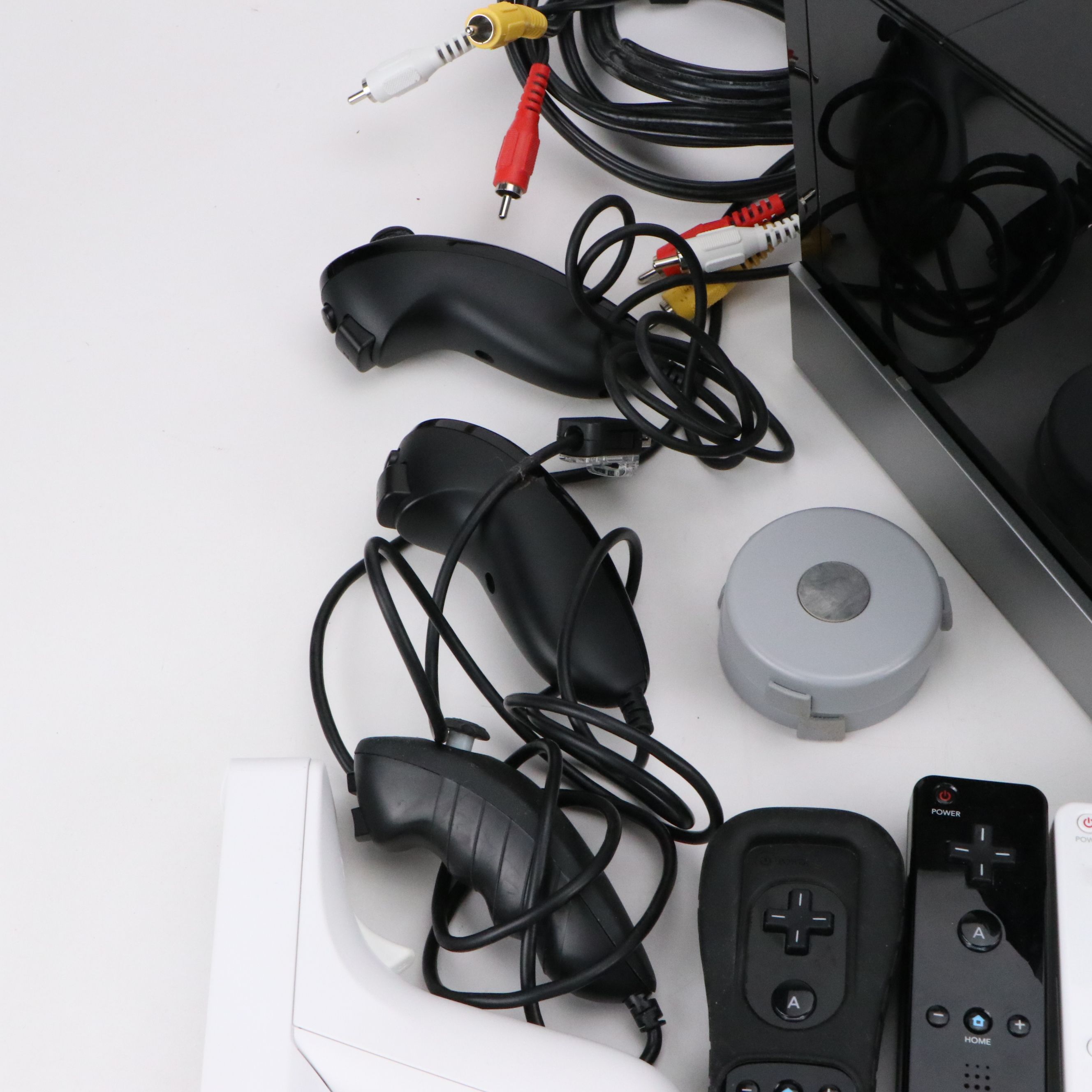 Nintendo Wii with Wii Fit, Wii Sports, and Other Games and Accessories