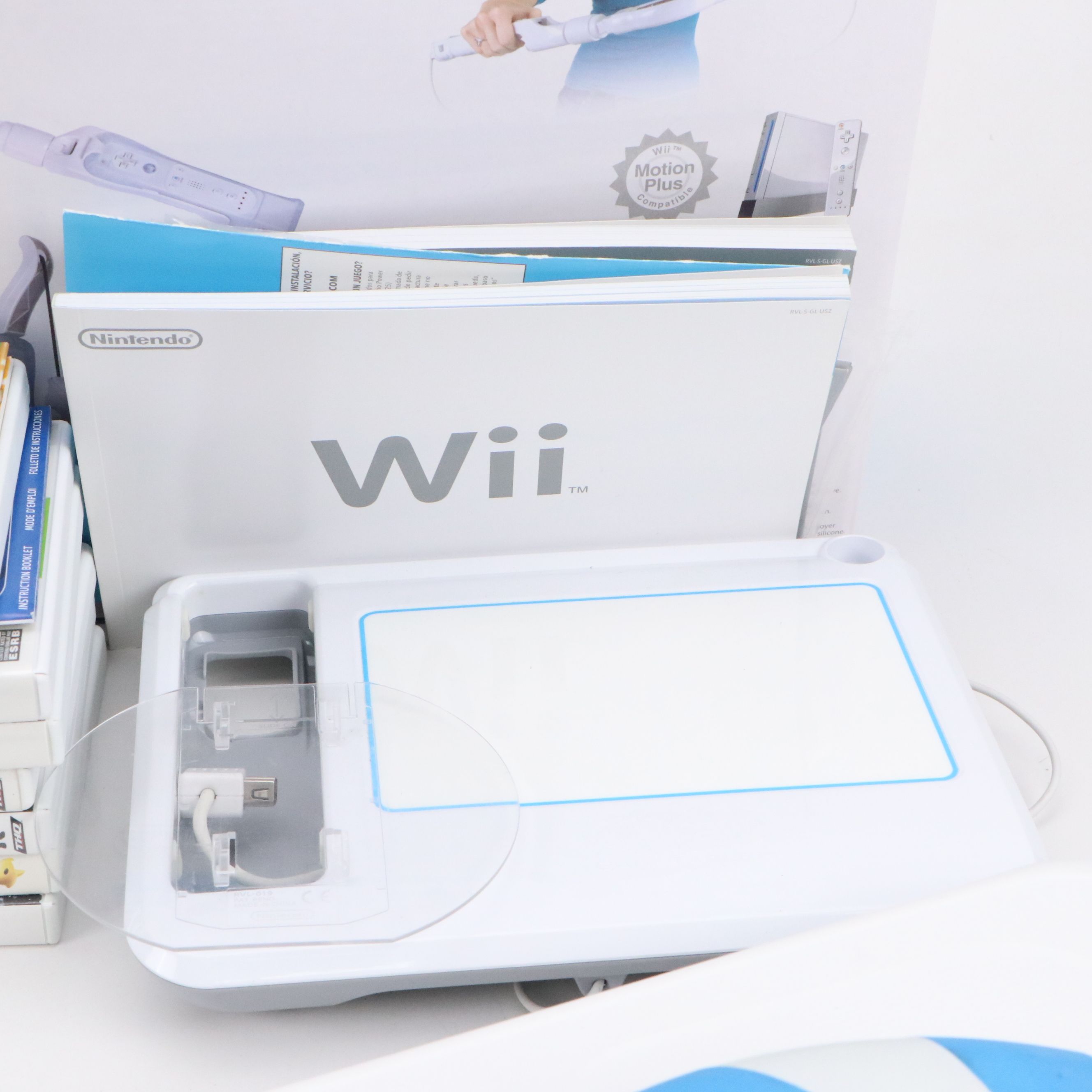 Nintendo Wii with Wii Fit, Wii Sports, and Other Games and Accessories