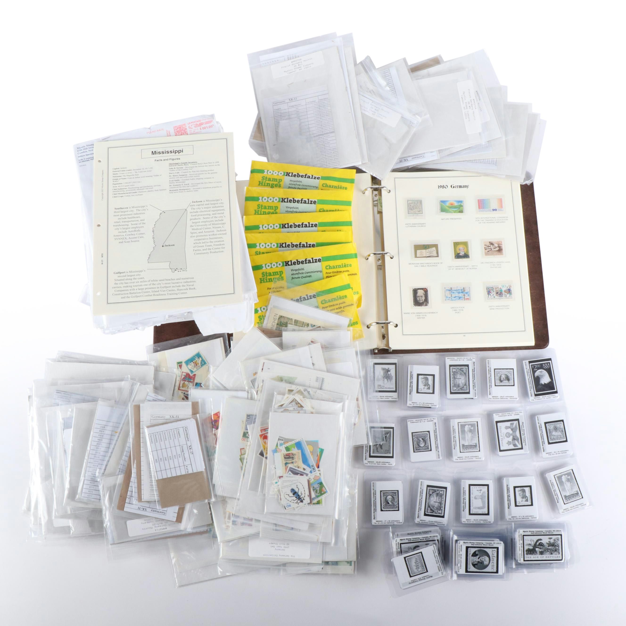 Collection of German Stamps, Year Sets, an Album, and Lots of German Mounts