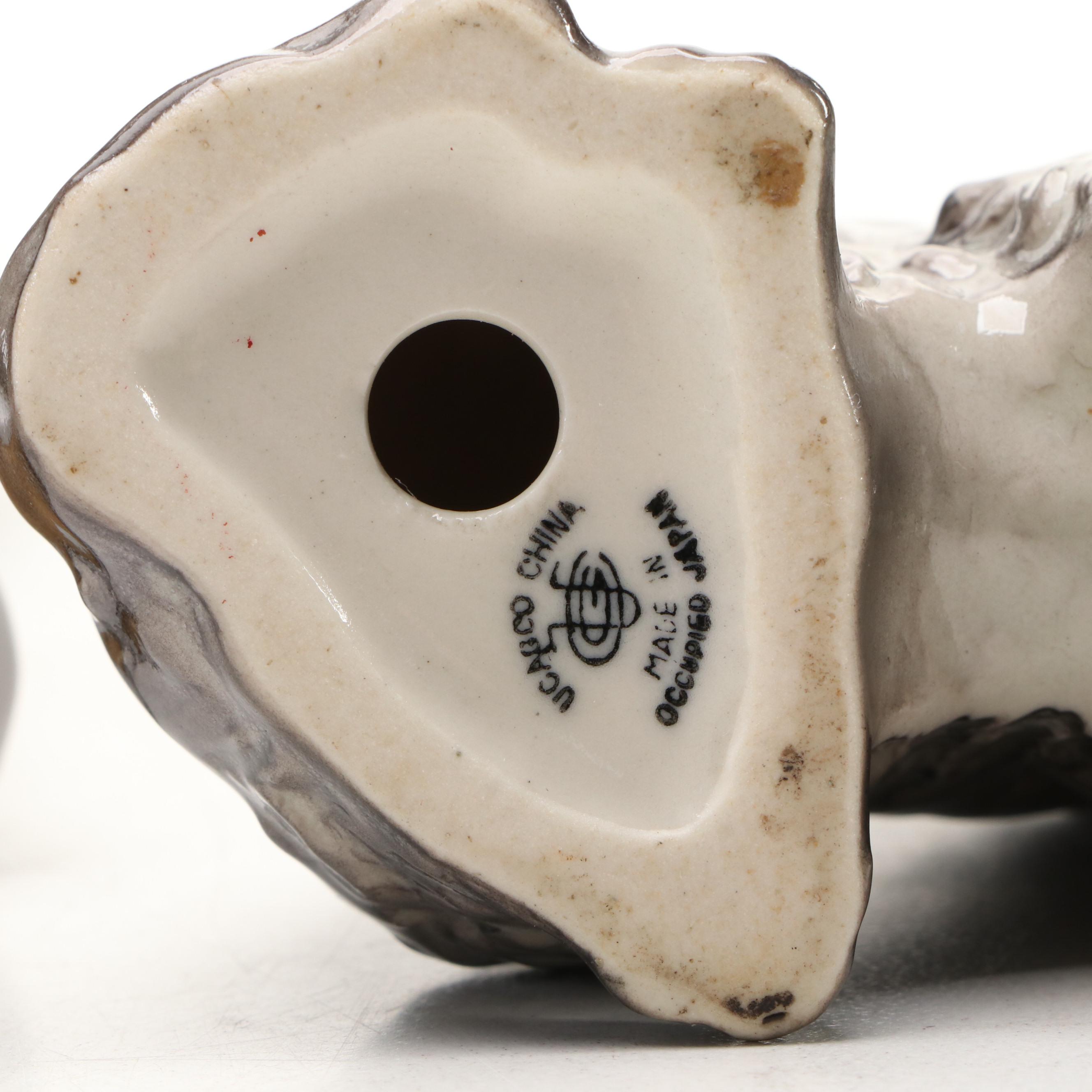 Schnauzer Dog Ceramic Bookends and Figurines, 20th C.