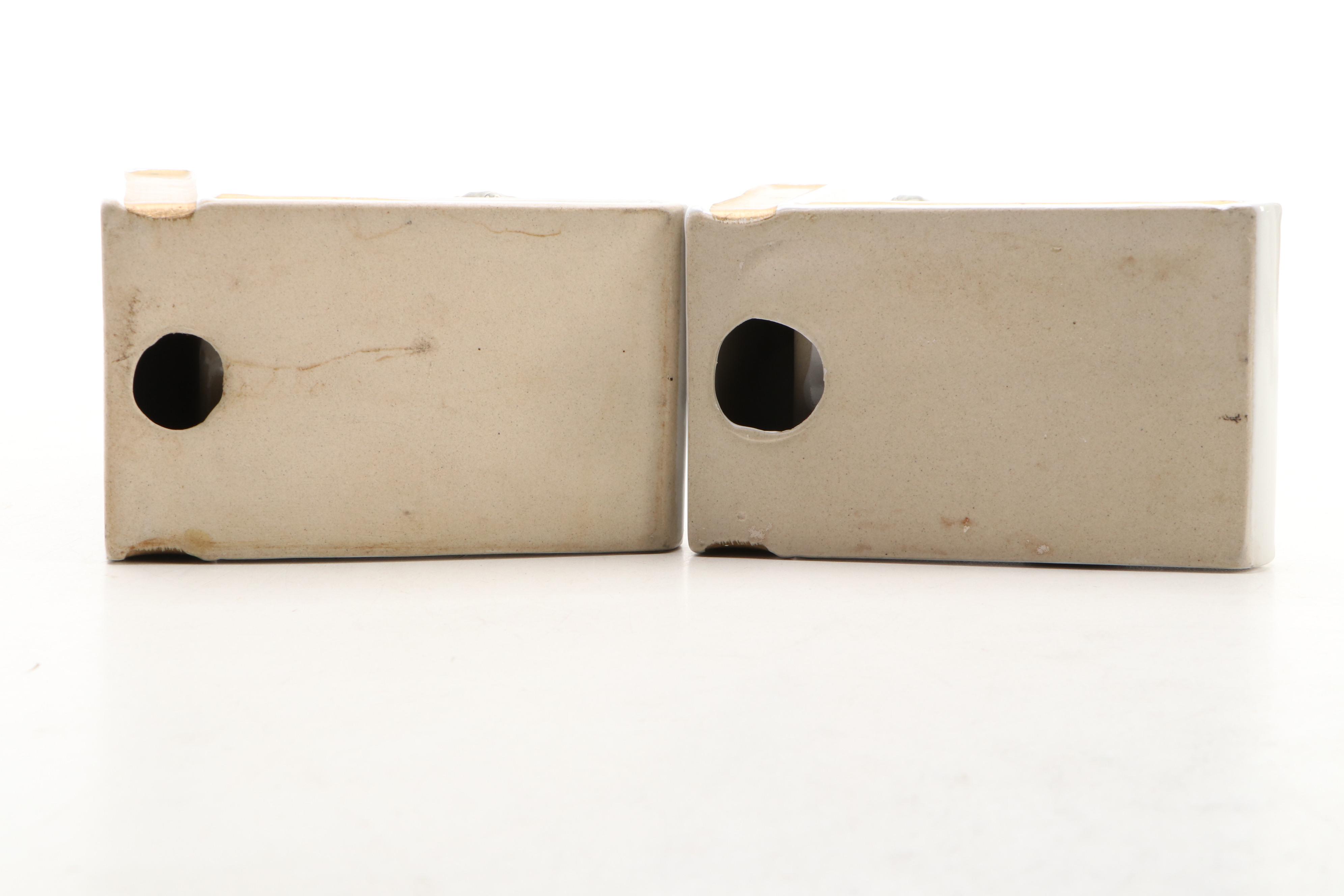 Schnauzer Dog Ceramic Bookends and Figurines, 20th C.