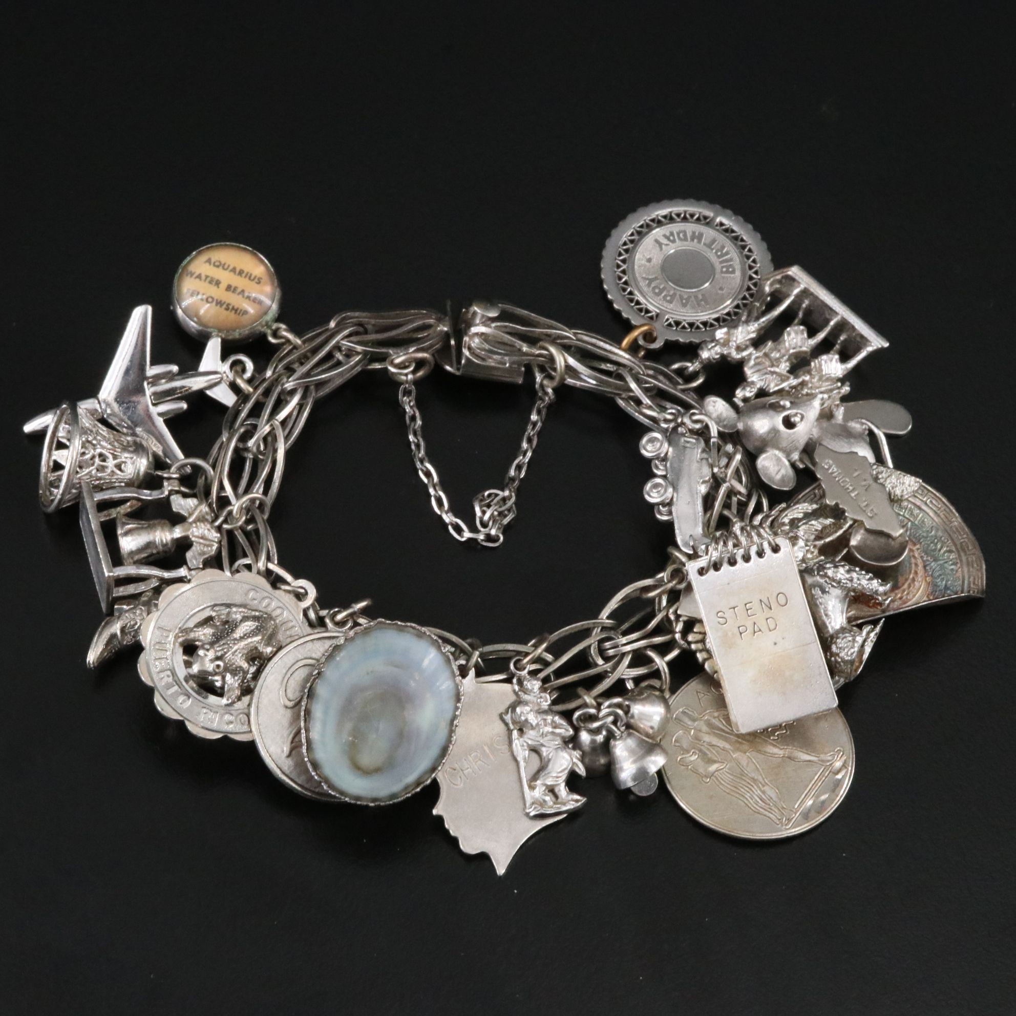Sterling Bracelet Including Travel and Commemorative Charms