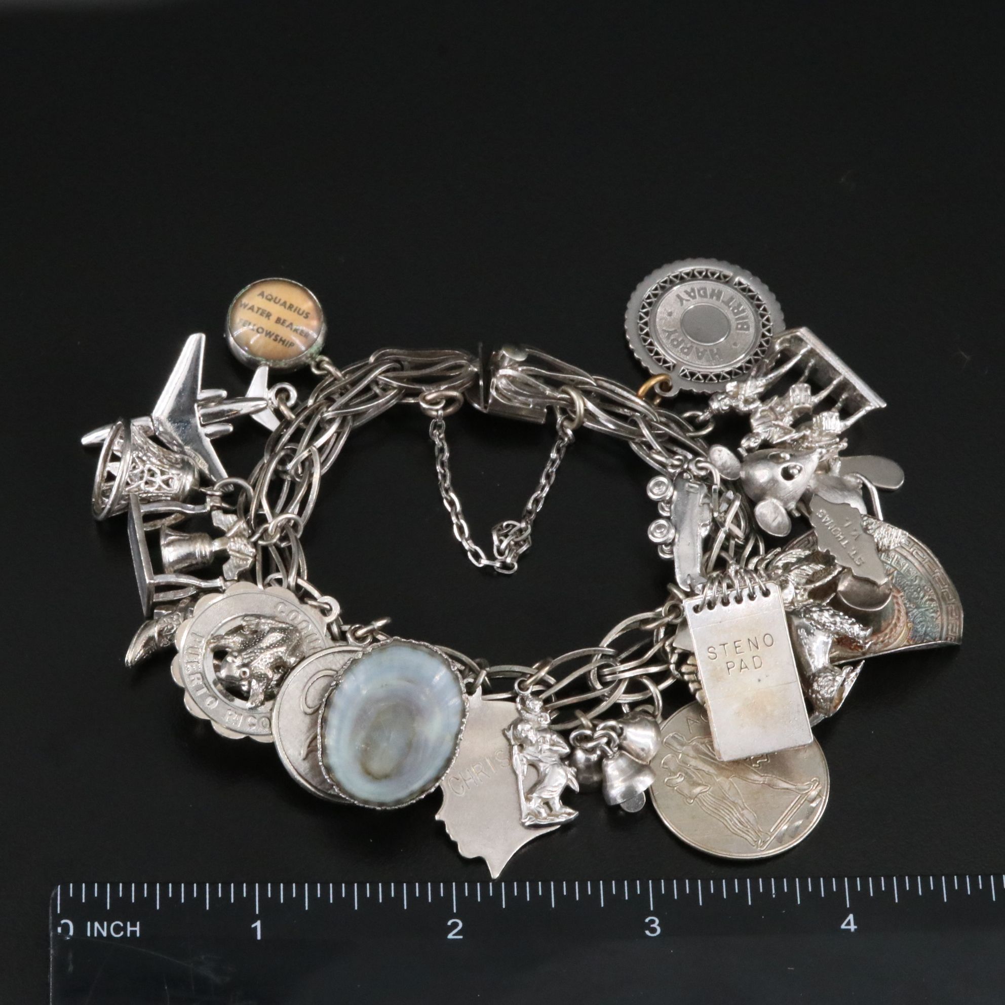 Sterling Bracelet Including Travel and Commemorative Charms