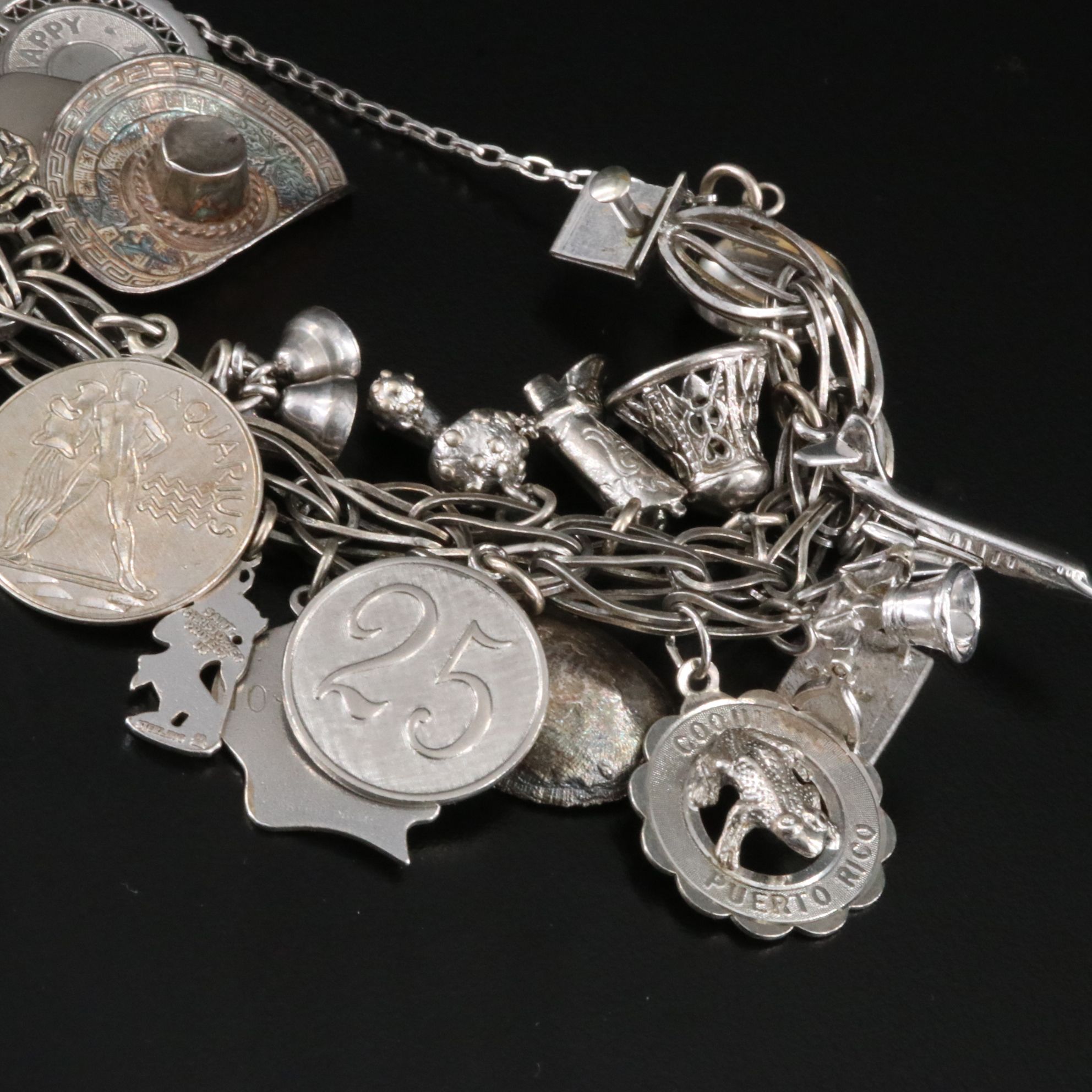 Sterling Bracelet Including Travel and Commemorative Charms
