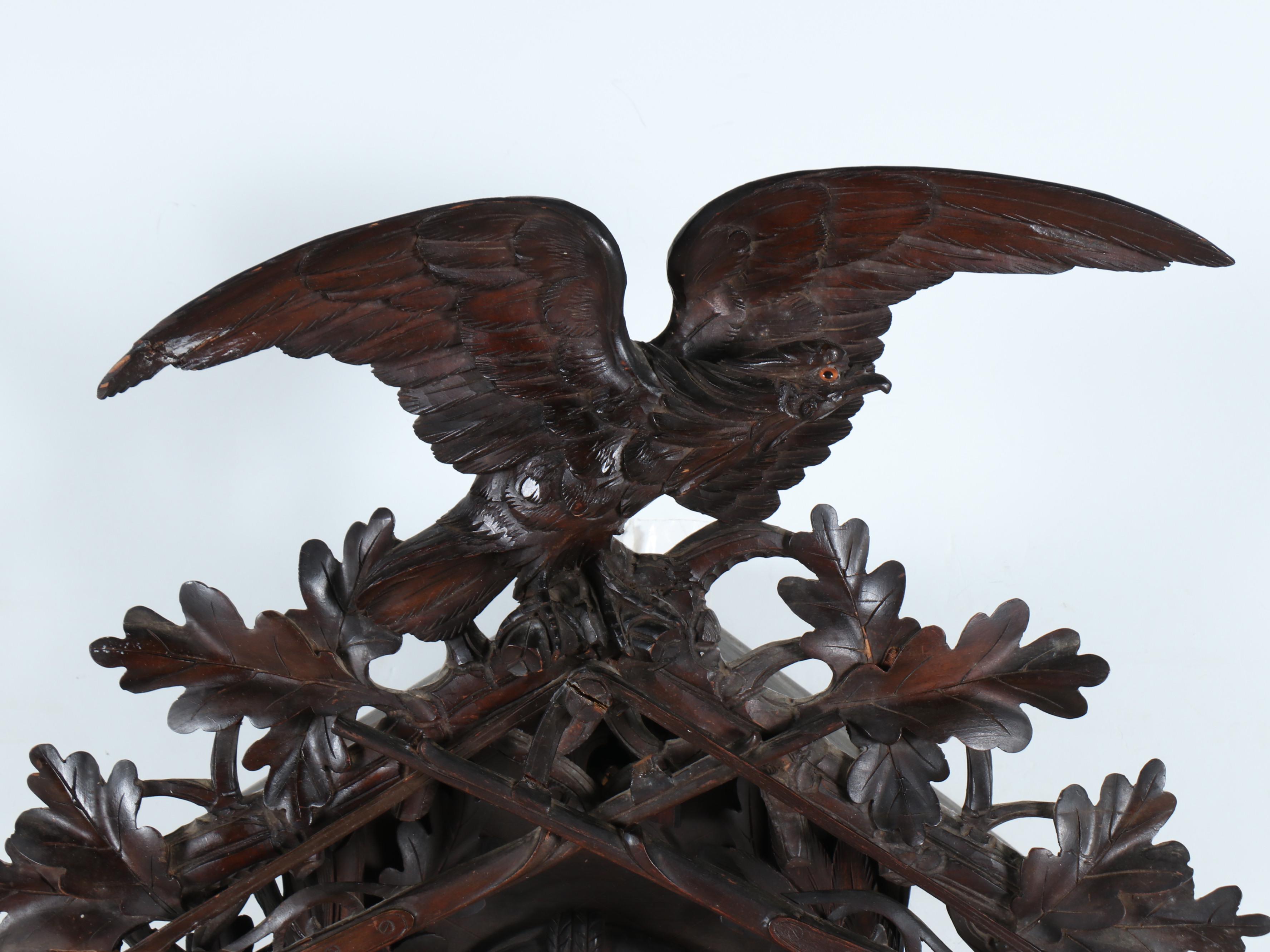 German Black Forest Style Carved Walnut Hunting Trophies Cuckoo Clock