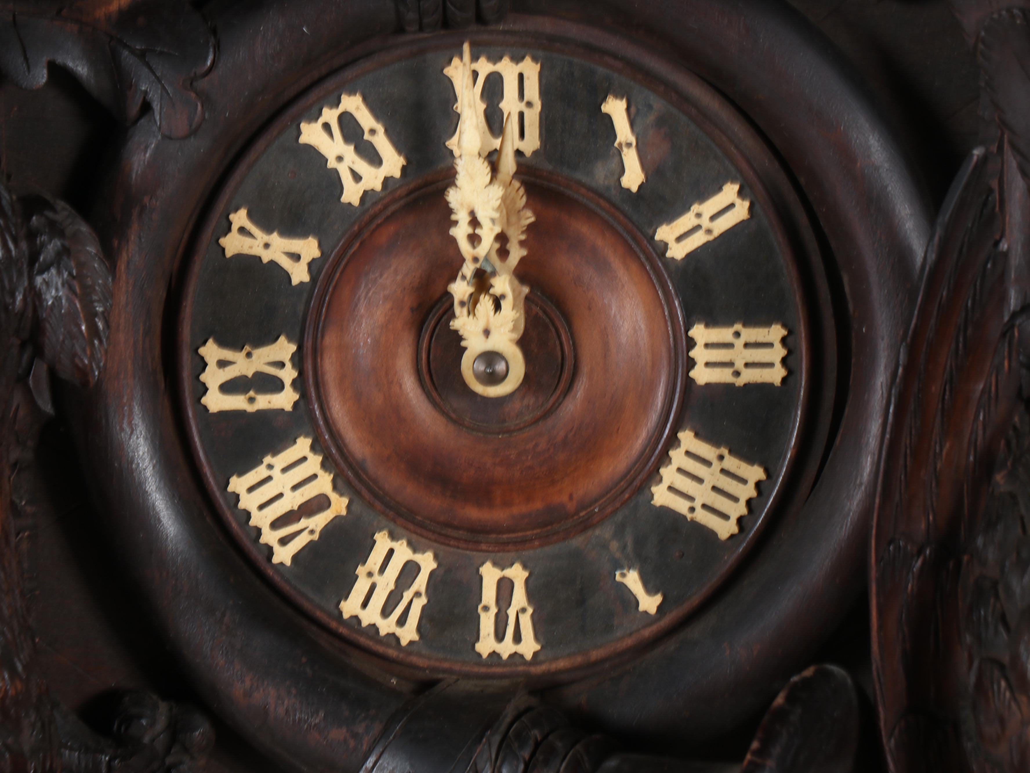 German Black Forest Style Carved Walnut Hunting Trophies Cuckoo Clock