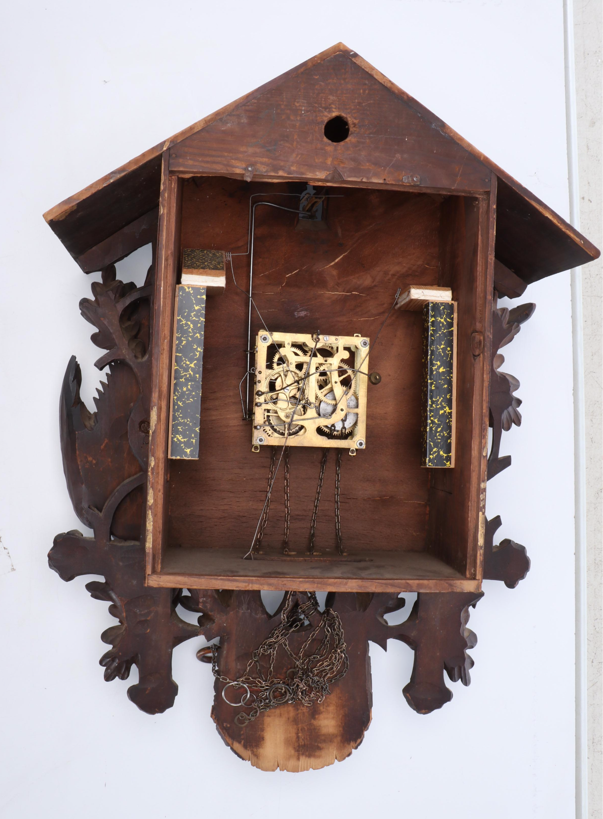 German Black Forest Style Carved Walnut Hunting Trophies Cuckoo Clock