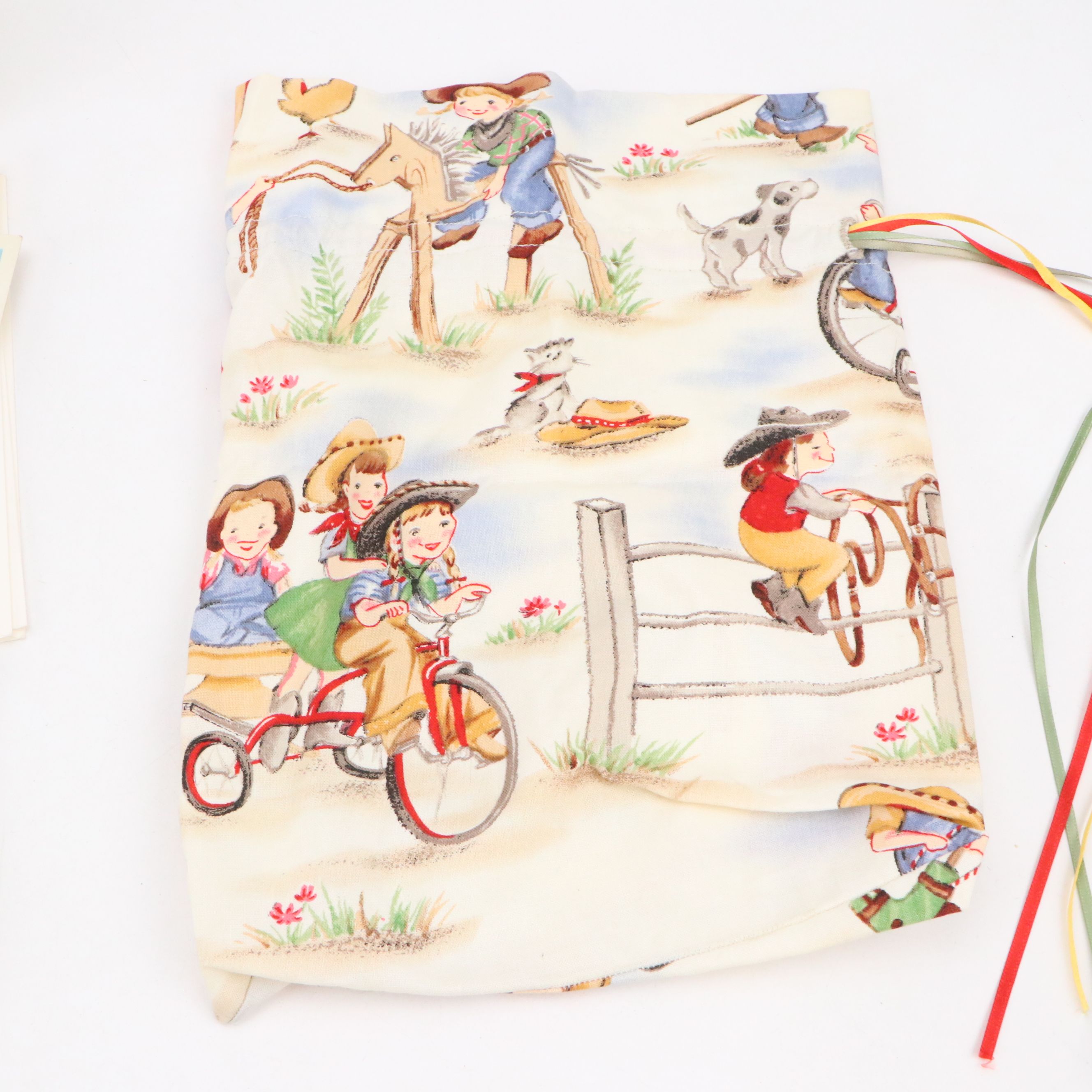 Cowgirl Books, Towels and Other Ephemera with Oklahoma! Playbill, 1940s