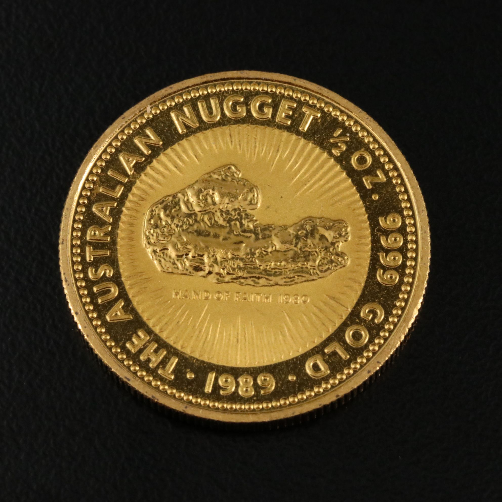1989 $50 Australia Hand of Faith Gold Nugget 1/2 OZT Gold Coin