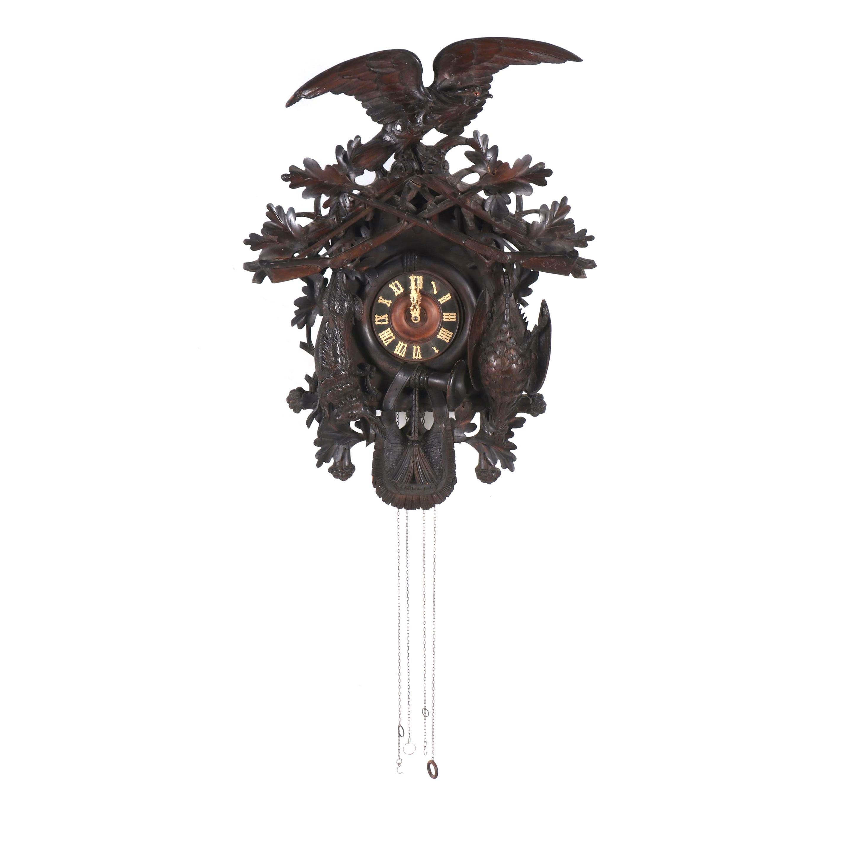 German Black Forest Style Carved Walnut Hunting Trophies Cuckoo Clock