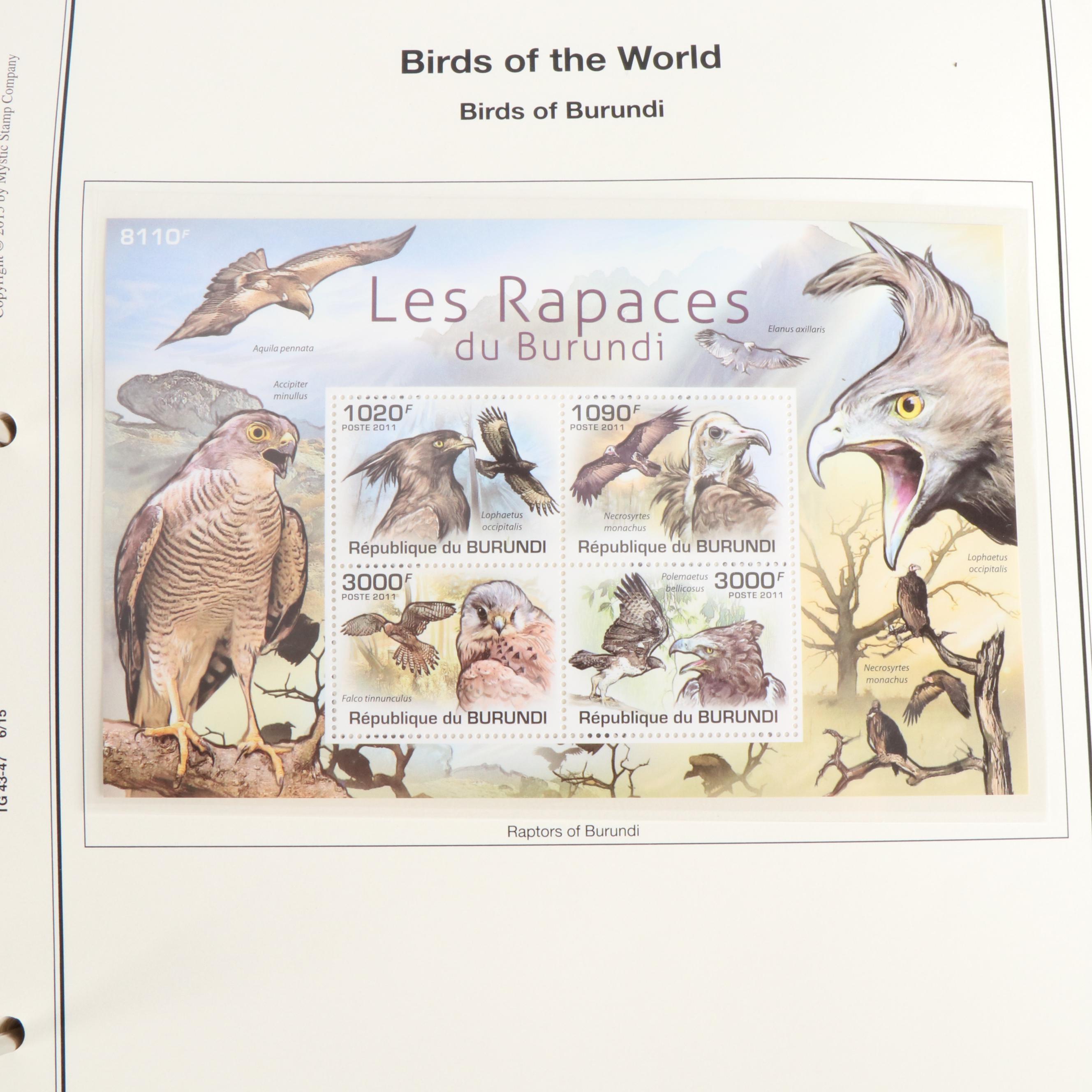 Four Albums of Themed Postage Stamps, Birds, Fish, and More