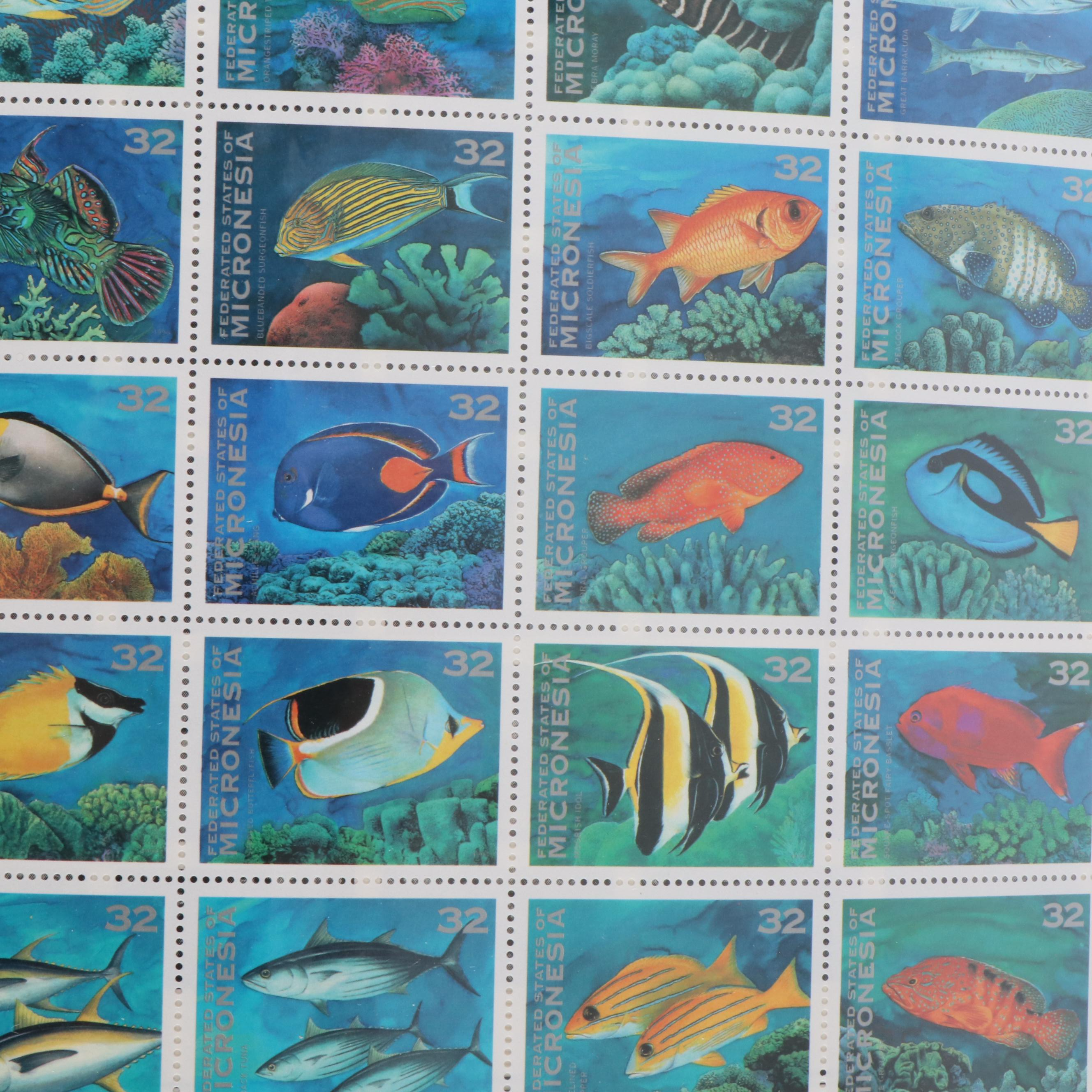 Four Albums of Themed Postage Stamps, Birds, Fish, and More
