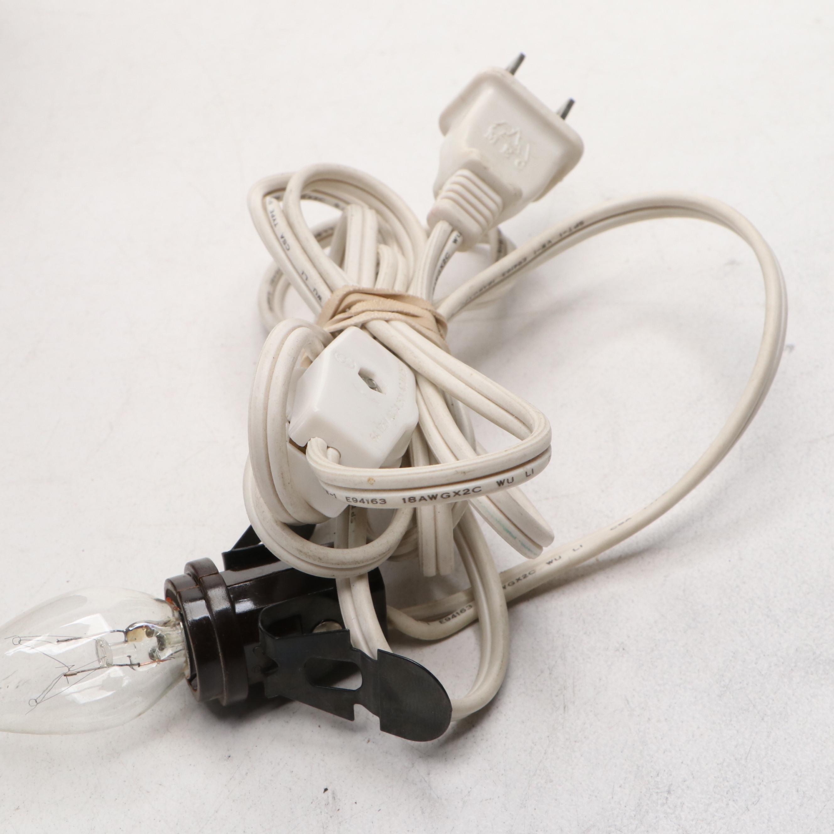 Figural Pottery Lamp with Woman Fetching Water