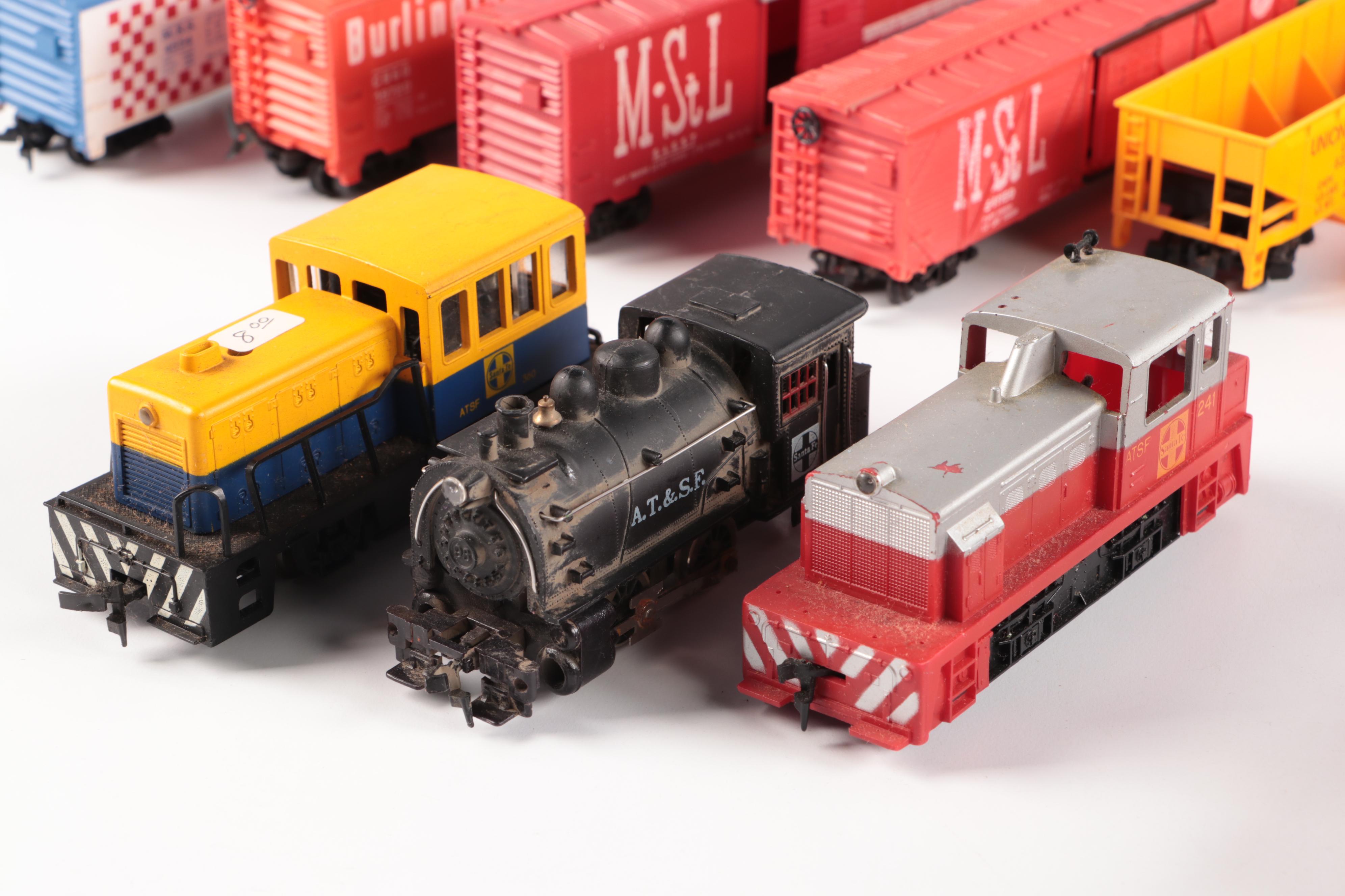 Tyco HO Scale Locomotive with More Train Cars, Late 20th Century