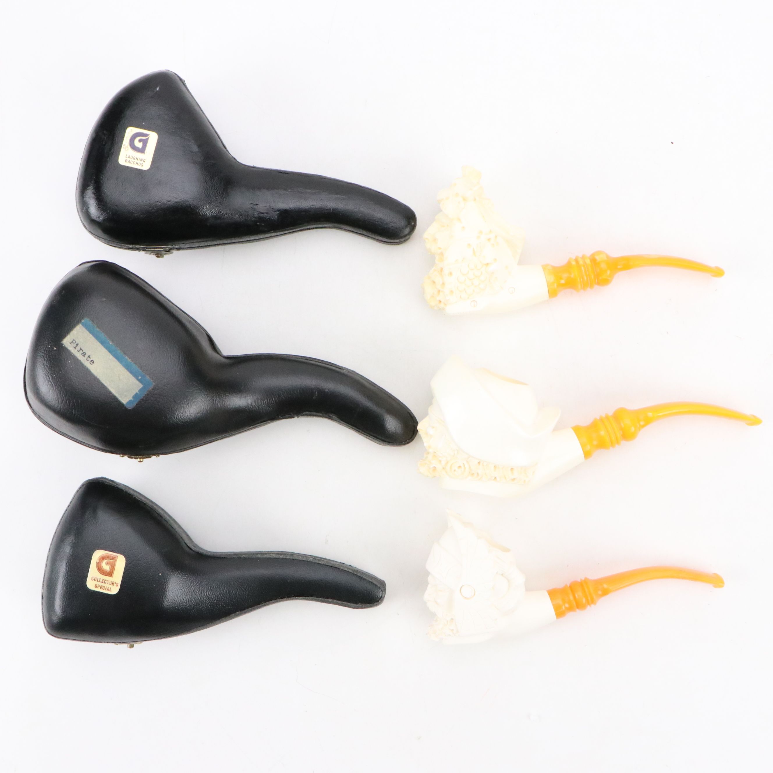 Golden Horn Meerschaum Carved Pirate, Laughing Bacchus with Other Pipes