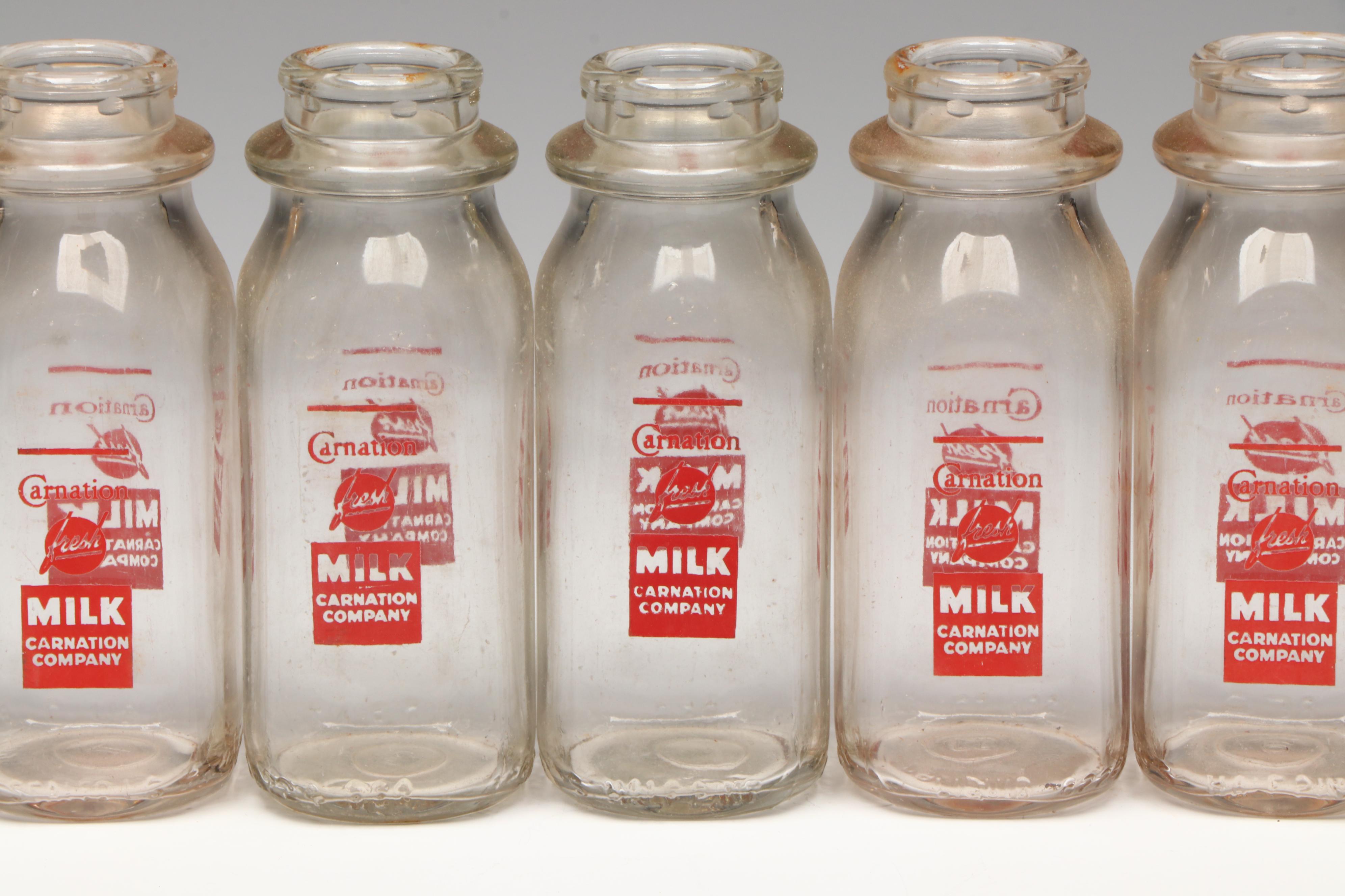 Carnation Milk Glass Bottles and Delivery Crate, Mid-20th Century