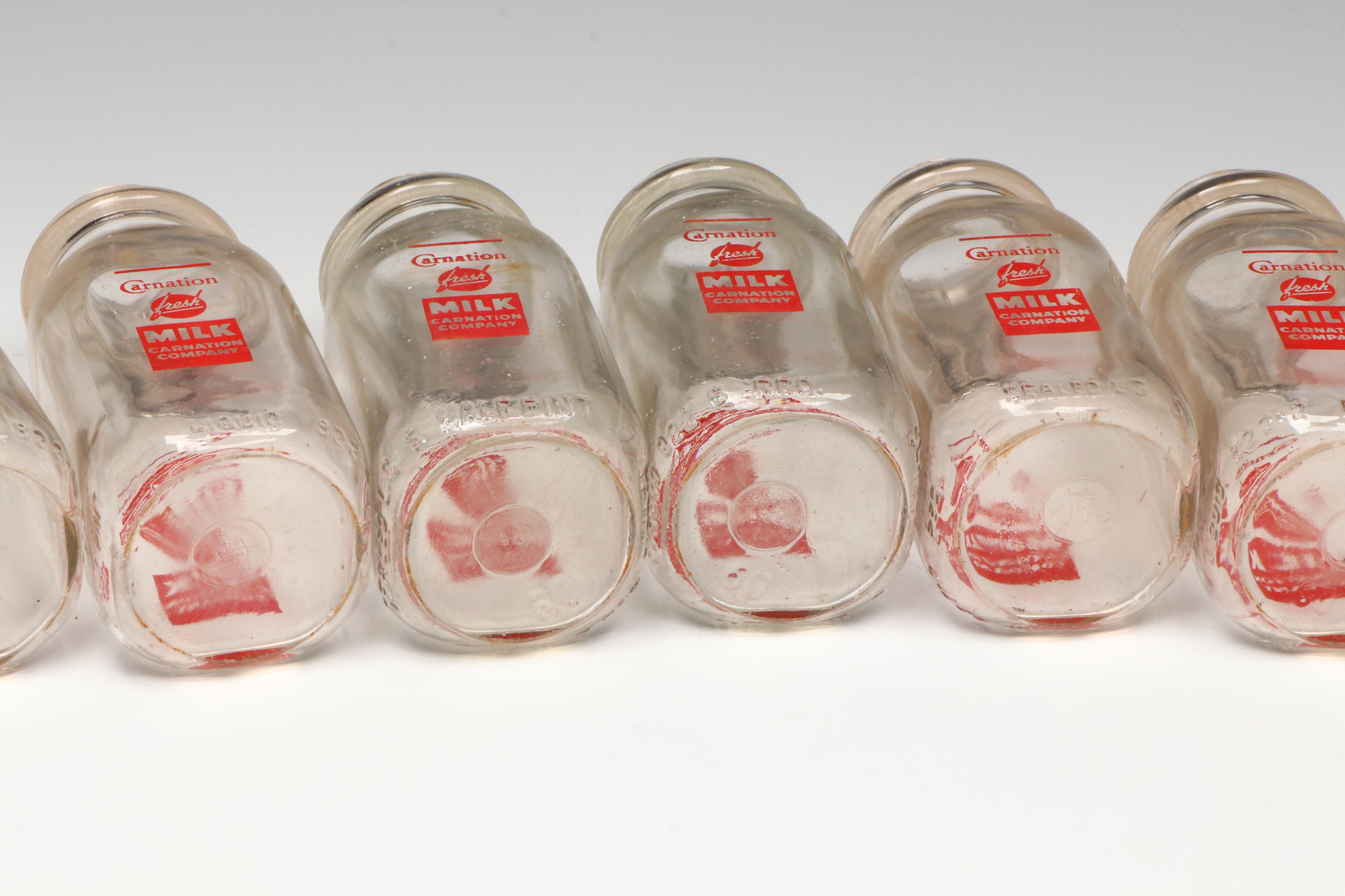 Carnation Milk Glass Bottles and Delivery Crate, Mid-20th Century