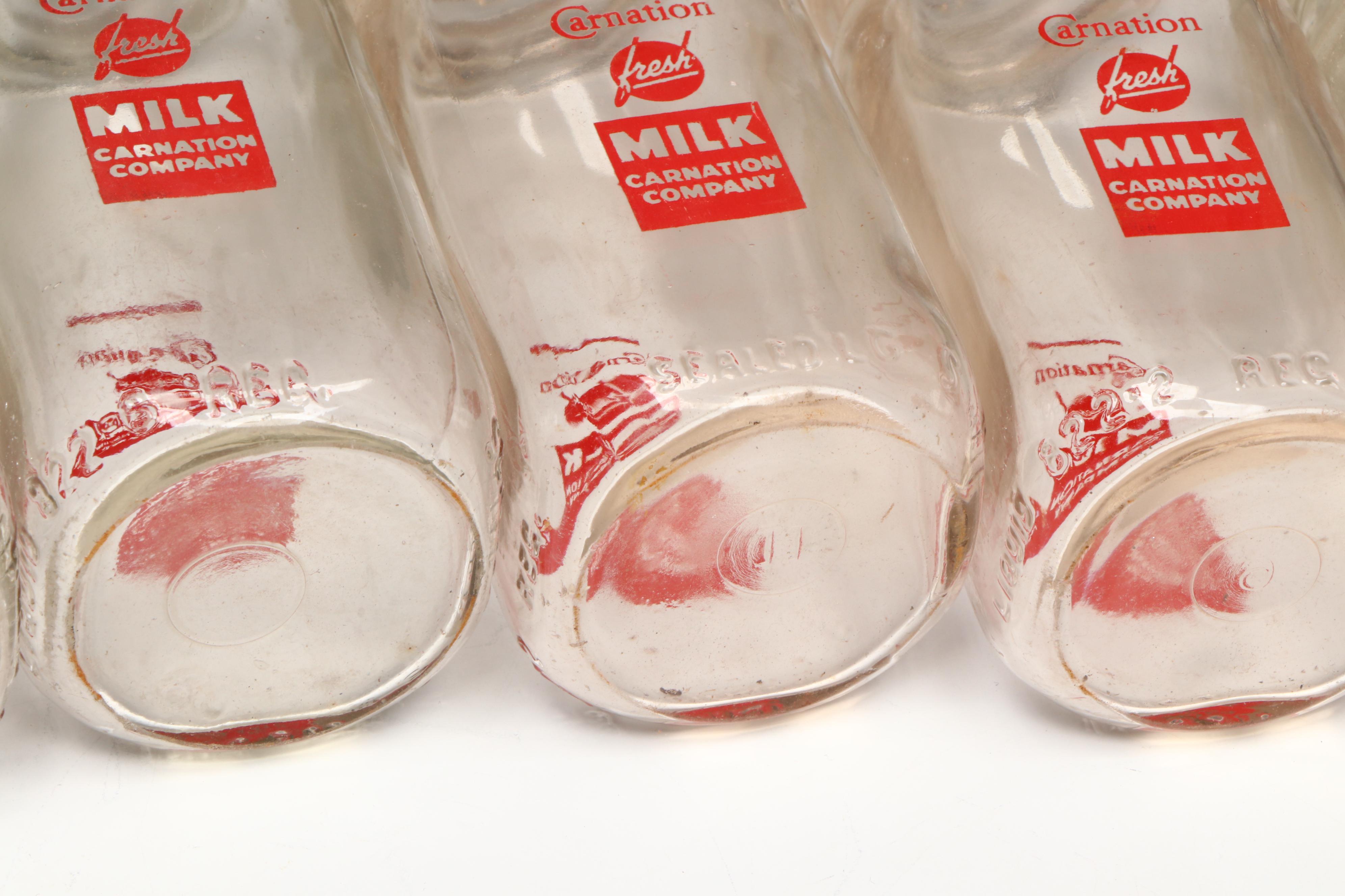 Carnation Milk Glass Bottles and Delivery Crate, Mid-20th Century