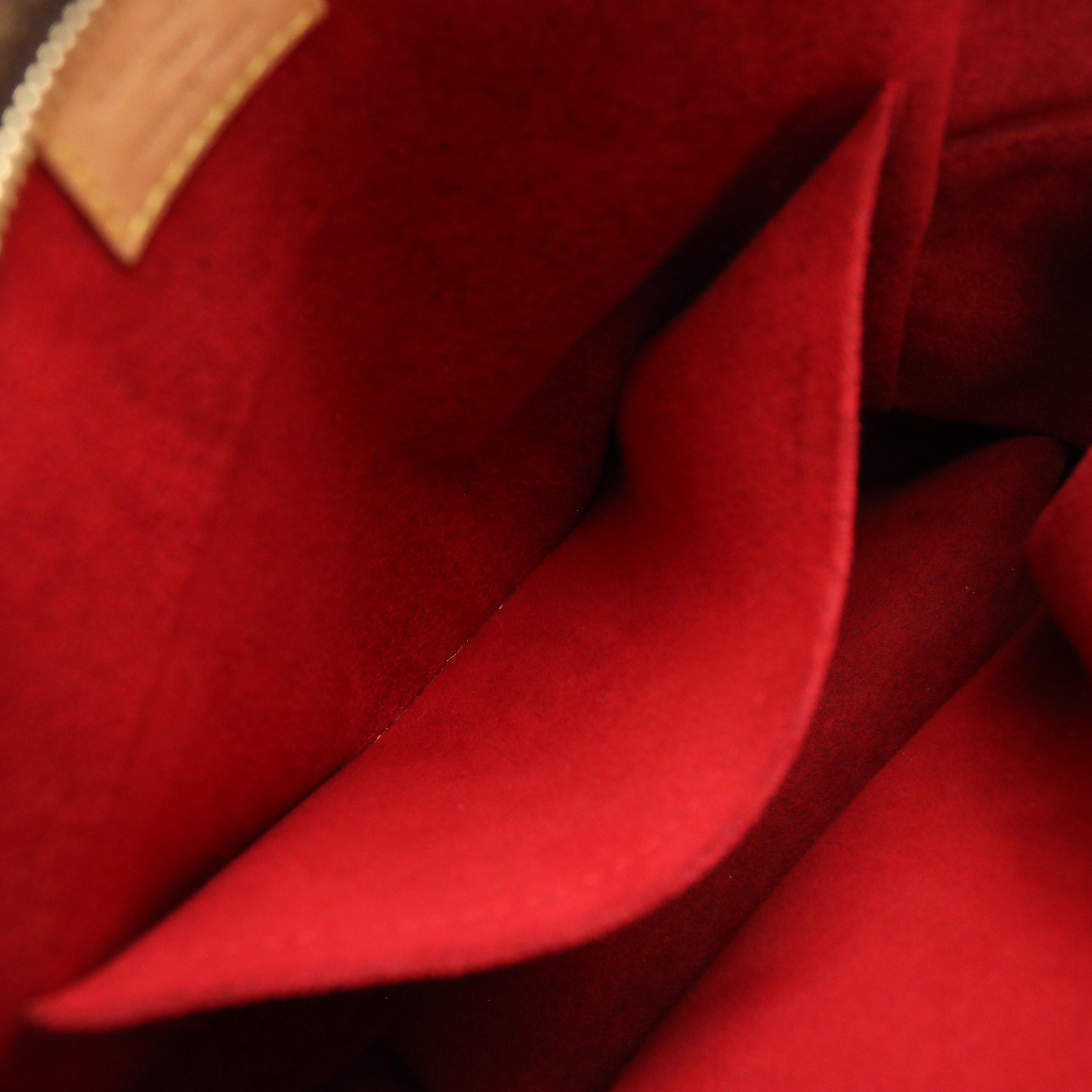 Louis Vuitton Excentri-Cité Handbag in Monogram Canvas and Vachetta Leather