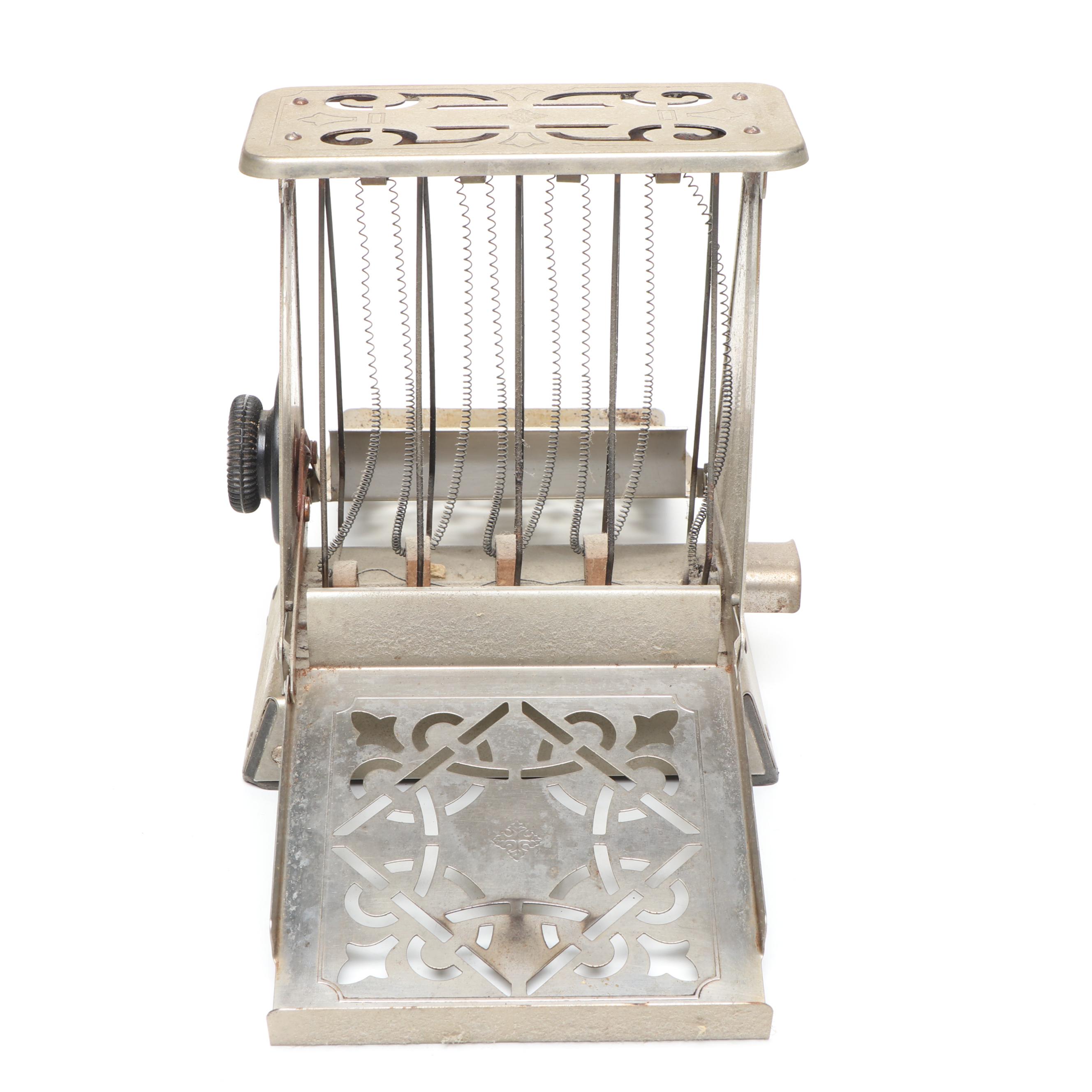 Edison Electric Hotpoint Toaster with Wooden Kitchen Utensils and Pie Pan