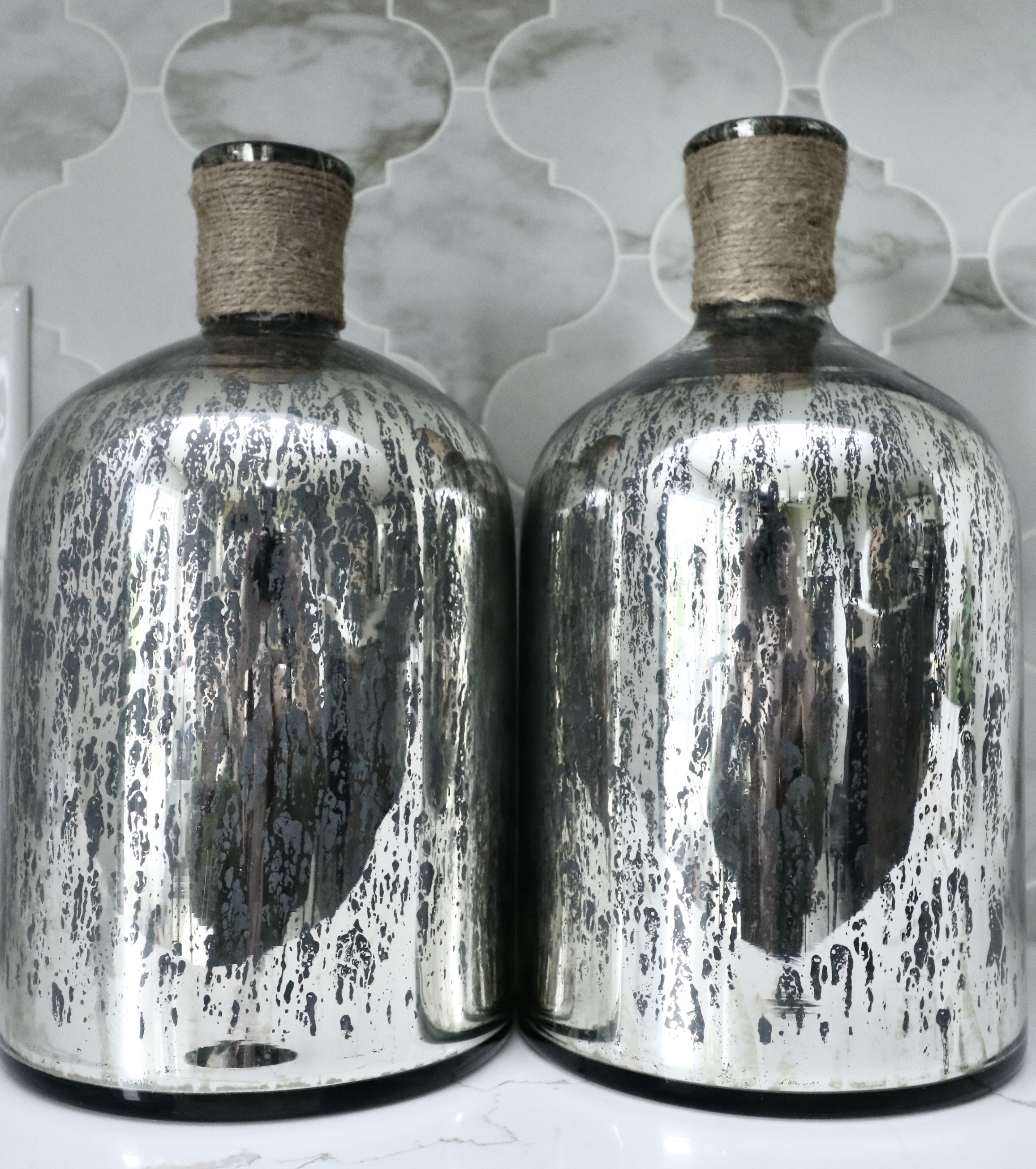 Footed Glass Tray with Decanters, Surya Mercury Glass Vases and Serving Boards