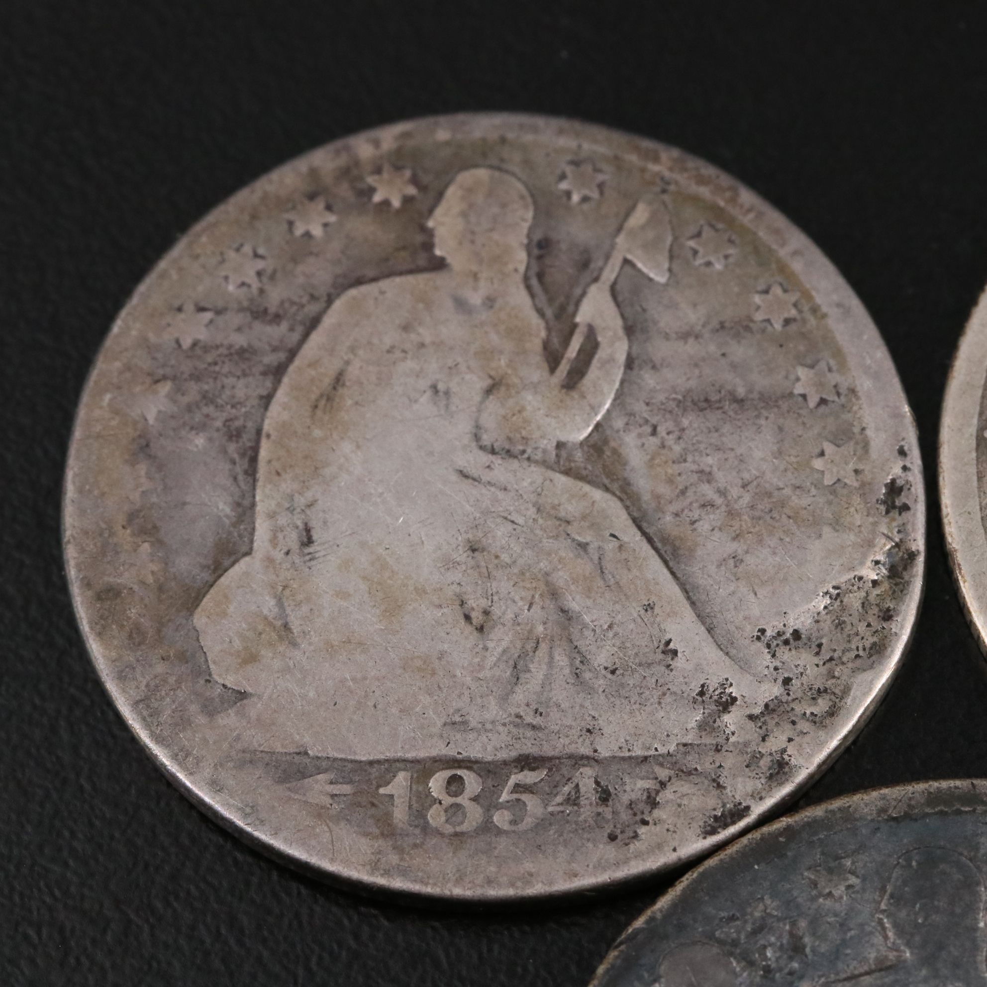 Three Seated Liberty Silver Half Dollars Including an 1855